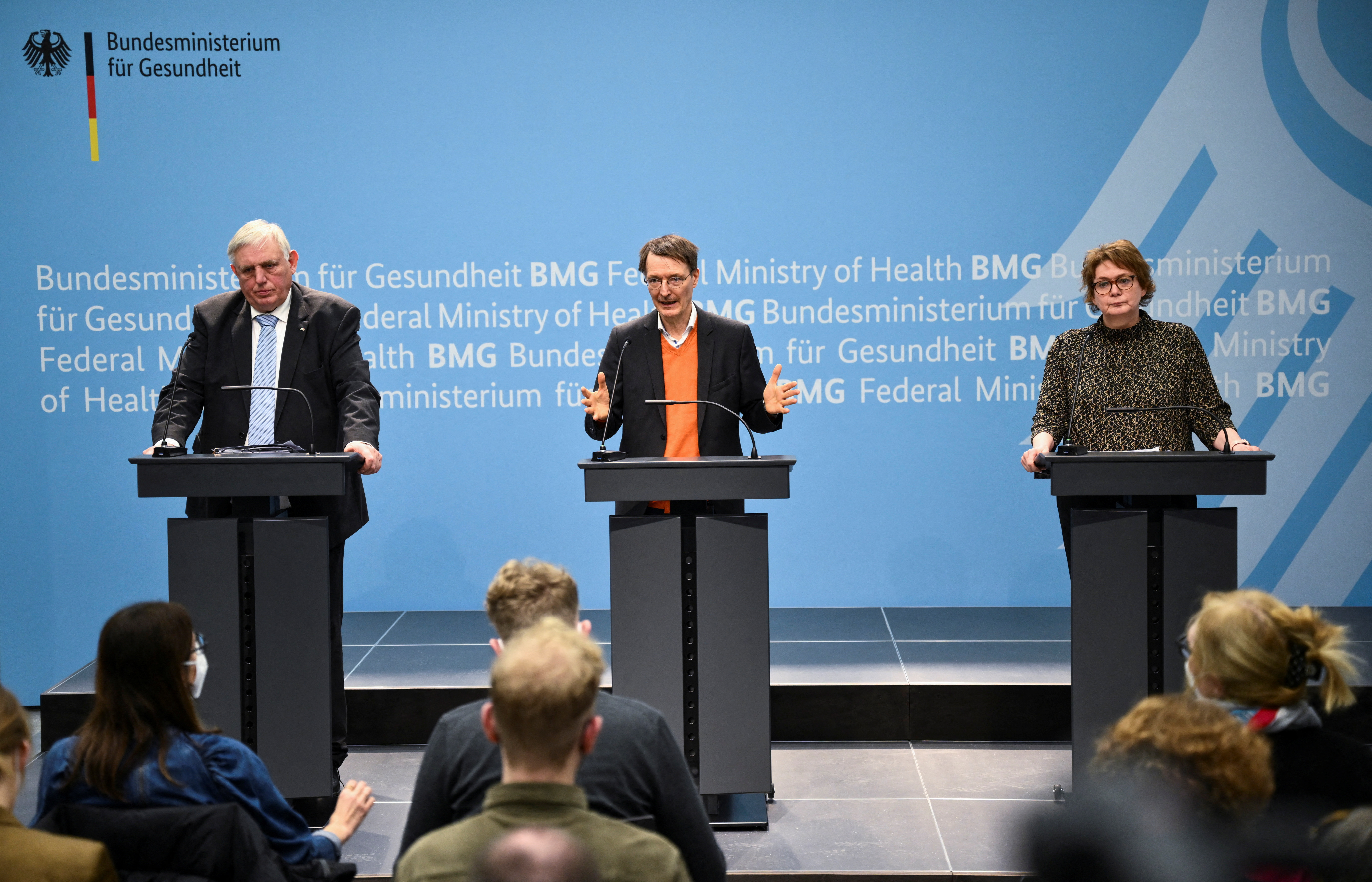 German Health Minister Karl Lauterbach, next to Health Minister of North Rhine-Westphalia Karl-Josef Laumann and Health Minister of Lower Saxony Daniela Behrens, holds a news conference to comment about imposing COVID-19 restrictions on travellers coming from China and about hospital reform following a Federal-State meeting, in Berlin, Germany, January 5, 2023. REUTERS/Annegret Hilse