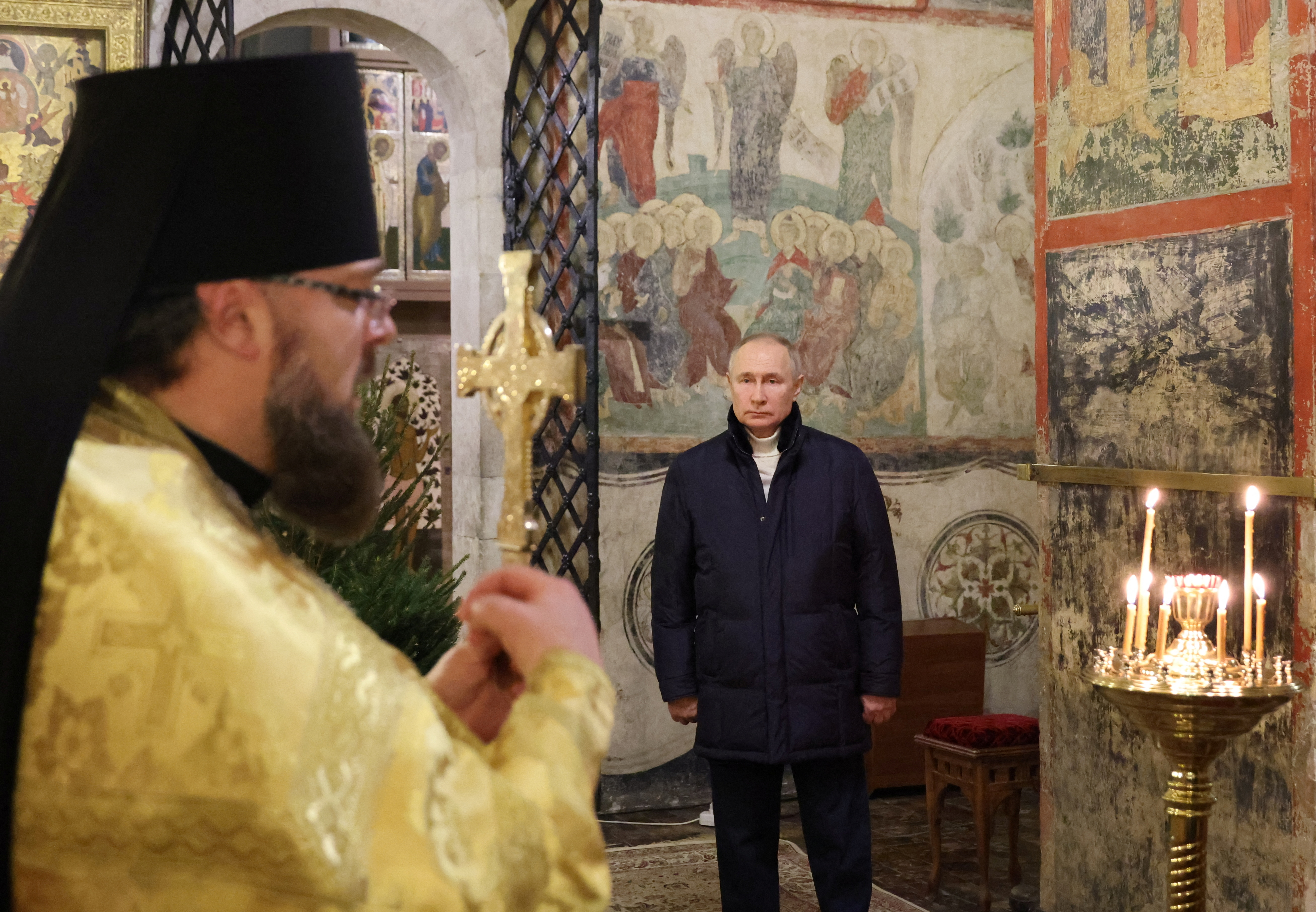 Putin attends the Orthodox Christmas service at the Kremlin in Moscow