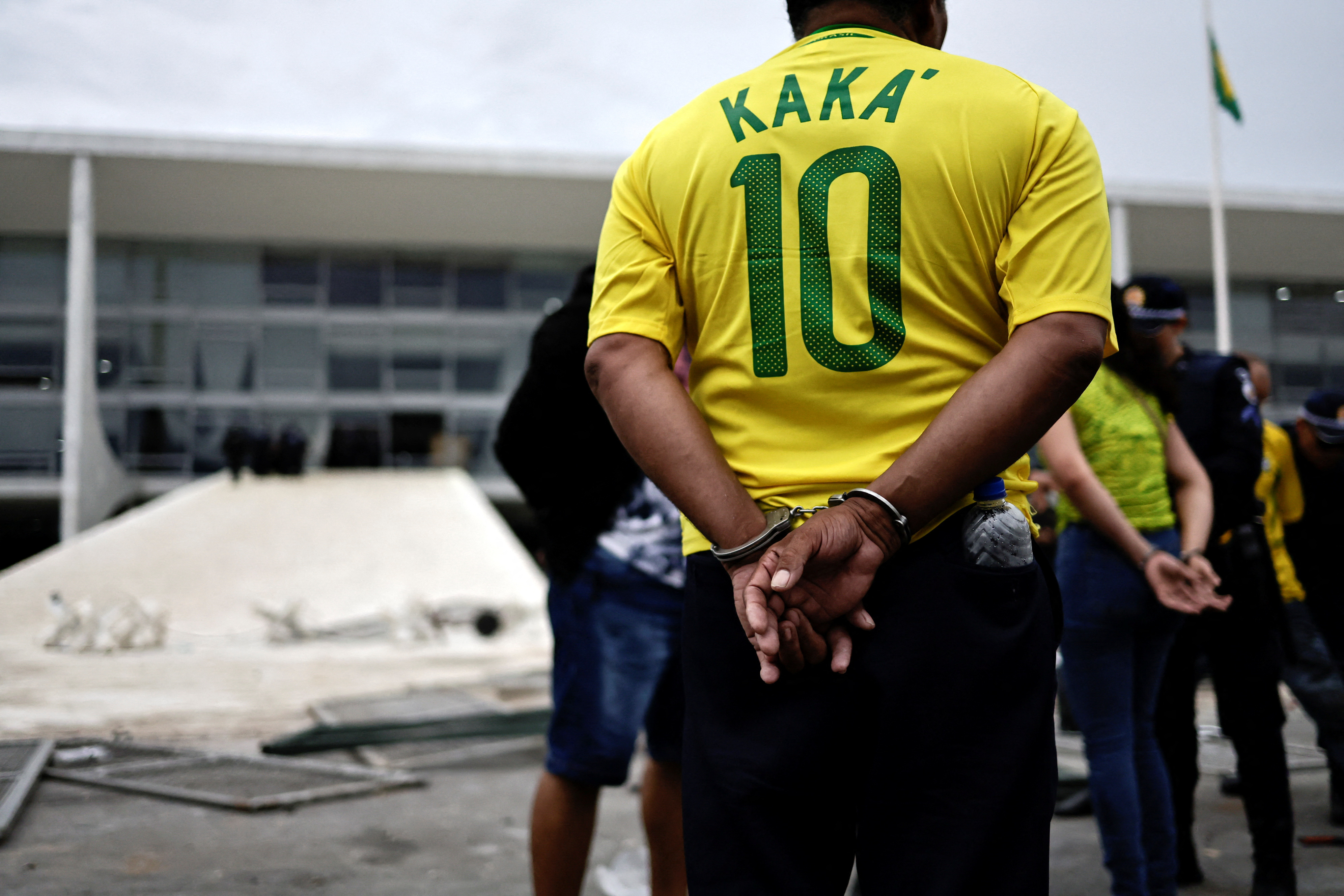 Security forces detain supporters of Brazil’s former President Jair Bolsonaro, outside Planalto Palace in Brasilia, Brazil, on January 8, 2023