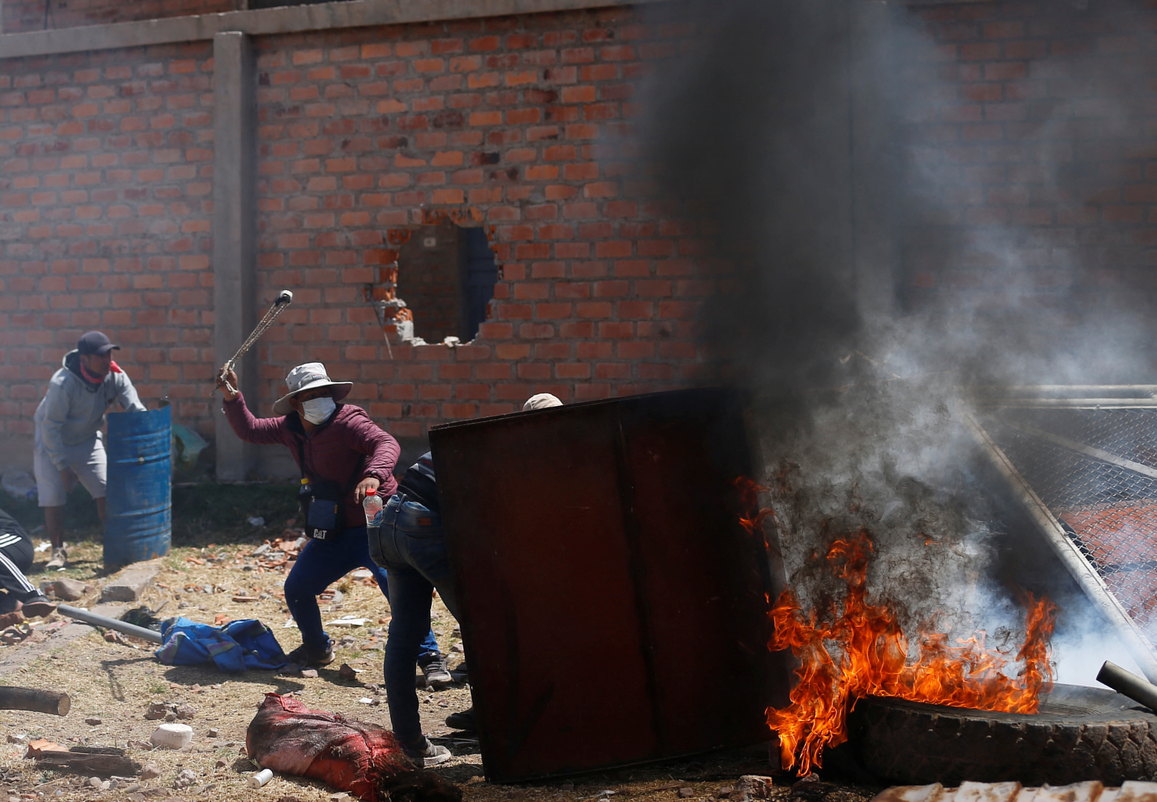 Riot police clash with anti-government protesters