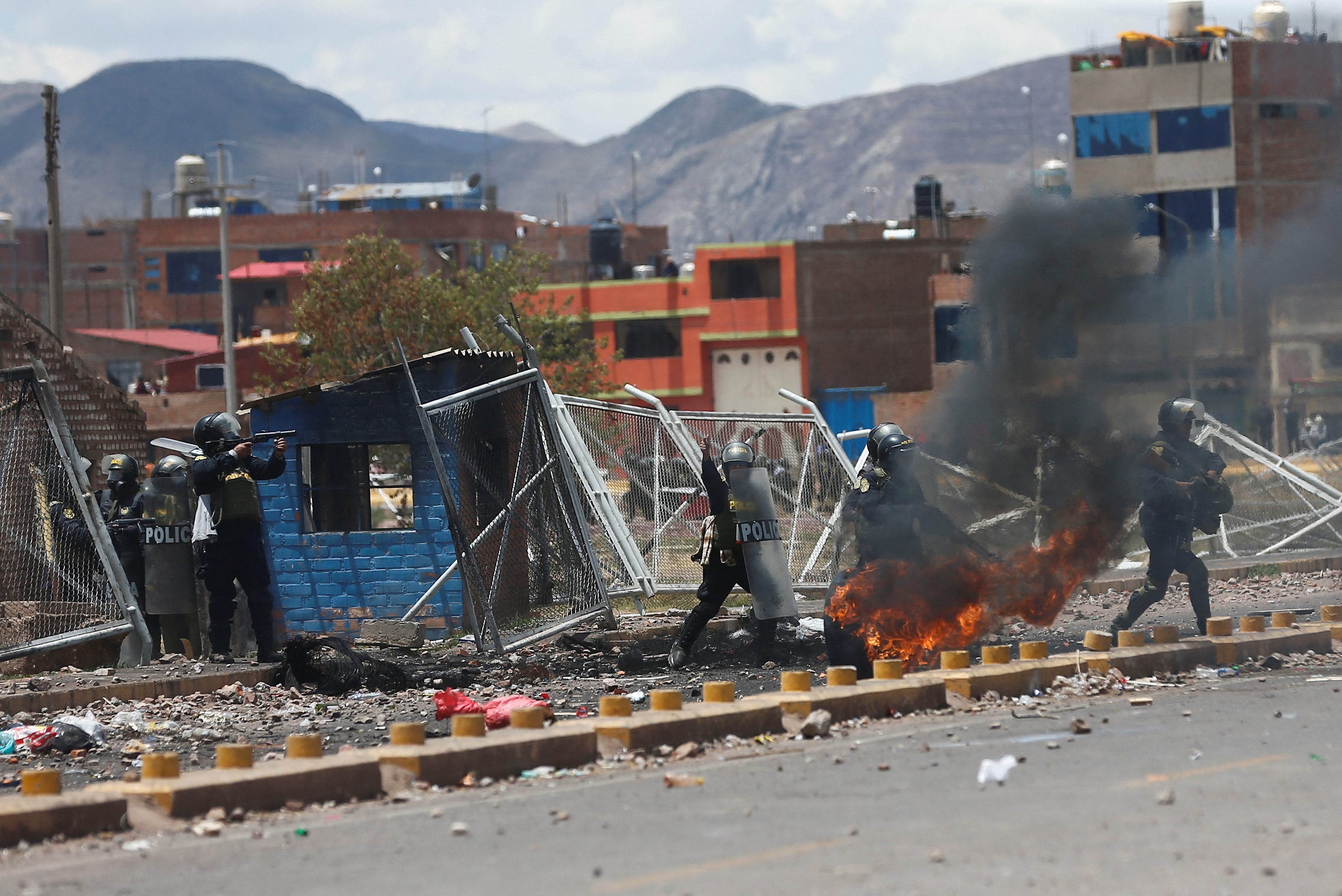 Riot police clash with anti-government protesters