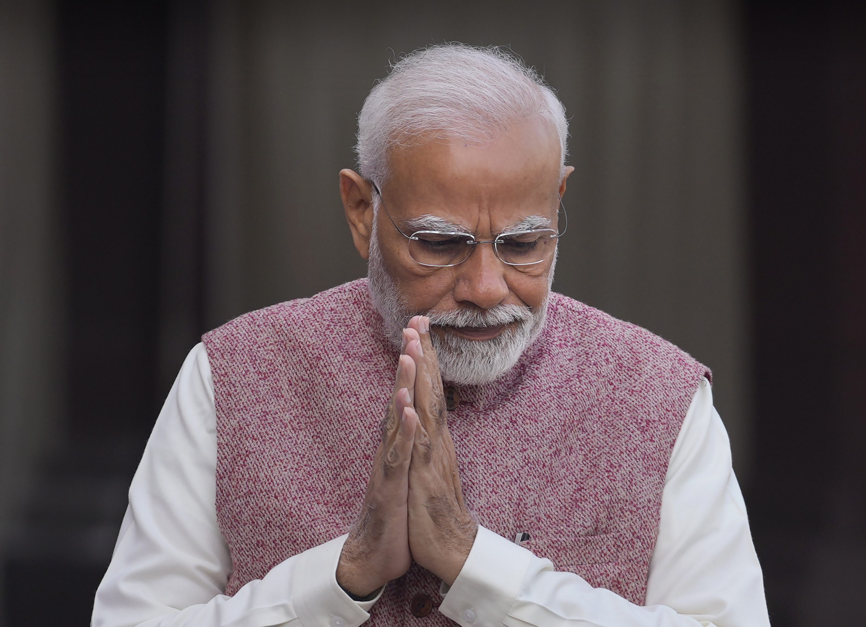 Narendra Modi greets his cabinet colleagues.