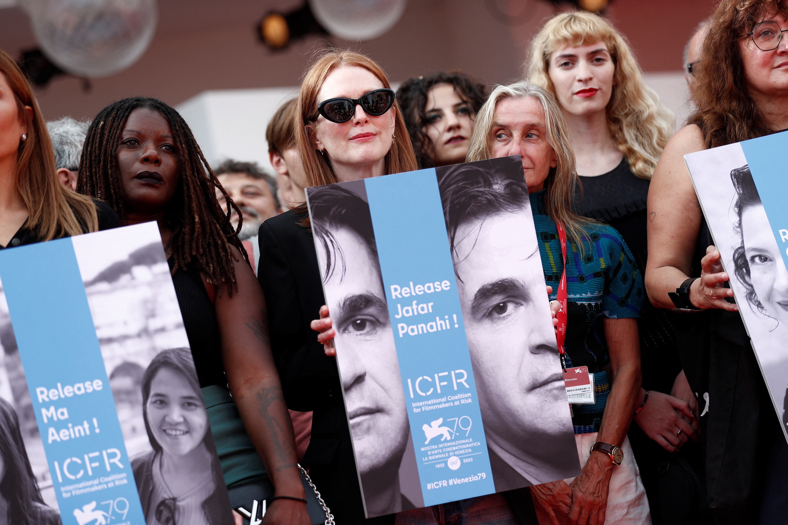 Julianne Moore takes part in a flash mob to protest over the arrest of Iranian director Jafar Panahi and in solidarity of Iranian filmmaker.