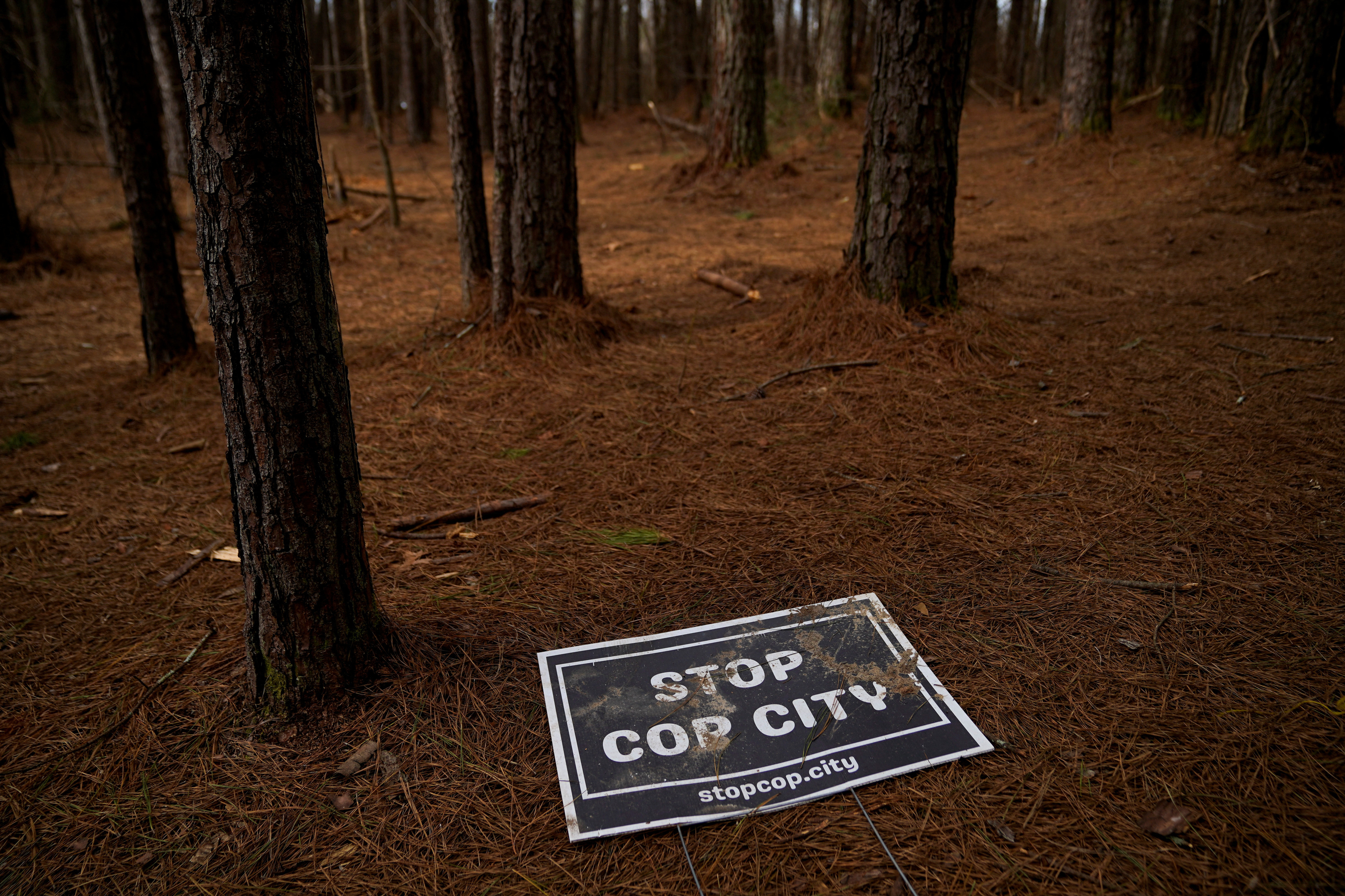 An abandoned protest sign is seen inside Weelaunee People’s Park, the planned site of the contentious ‘Cop City’ project, on January 21, 2023