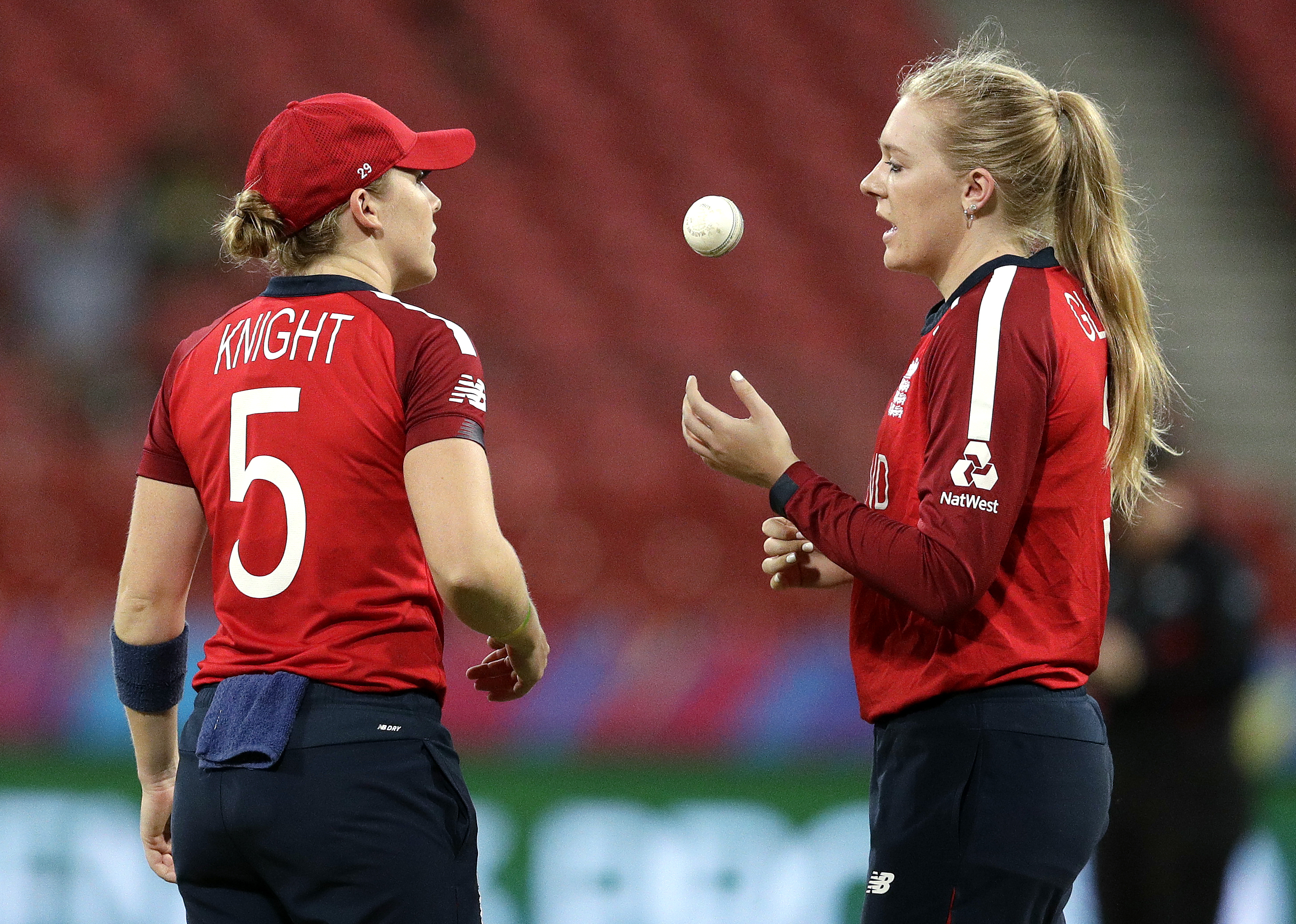 England’s captain Heather Knight, left, talks with Sarah Glenn during their Women’s T20 World Cup cricket match against West Indies in Sydney in 2020