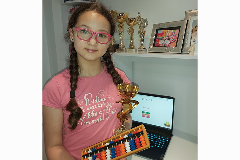Samira, who continues to study with online tutors, came second in a mental arithmetic competition in December 2022 [Courtesy of Zakhida Adylova]