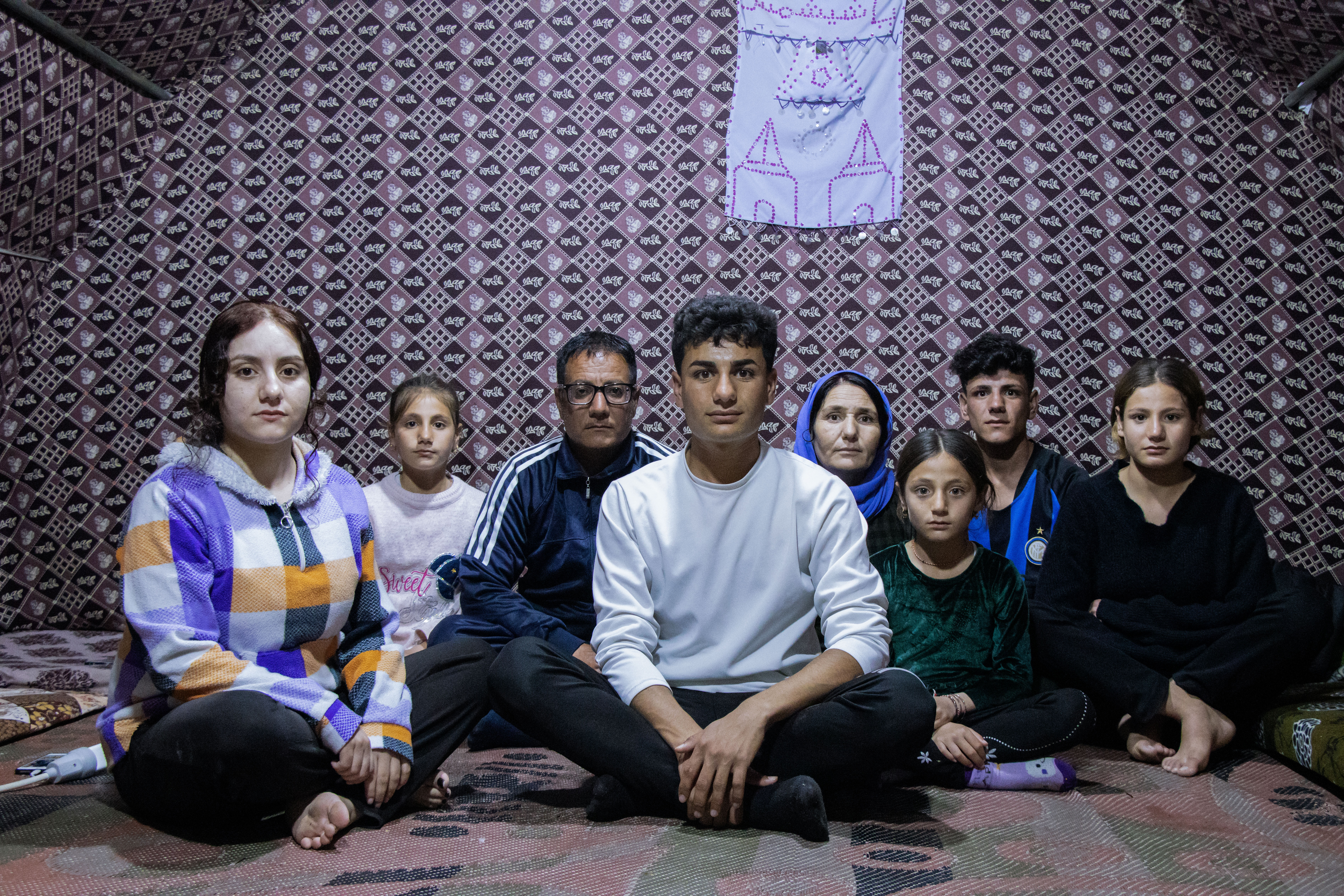 Nazar in his tent with his family in Kabartu camp. The 25 IDP camps in the Kurdish region host some180,000 Yazidis