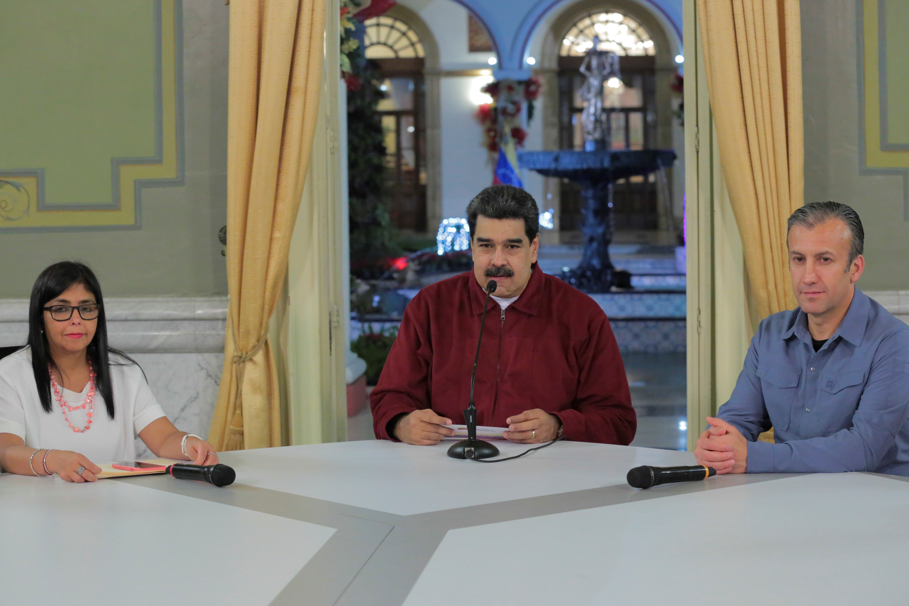 Venezuela's President Nicolas Maduro, centre, with Vice President Delcy Rodriguez, left, and Tareck El Aissami, right, at Miraflores Palace in Caracas, Venezuela in 2018