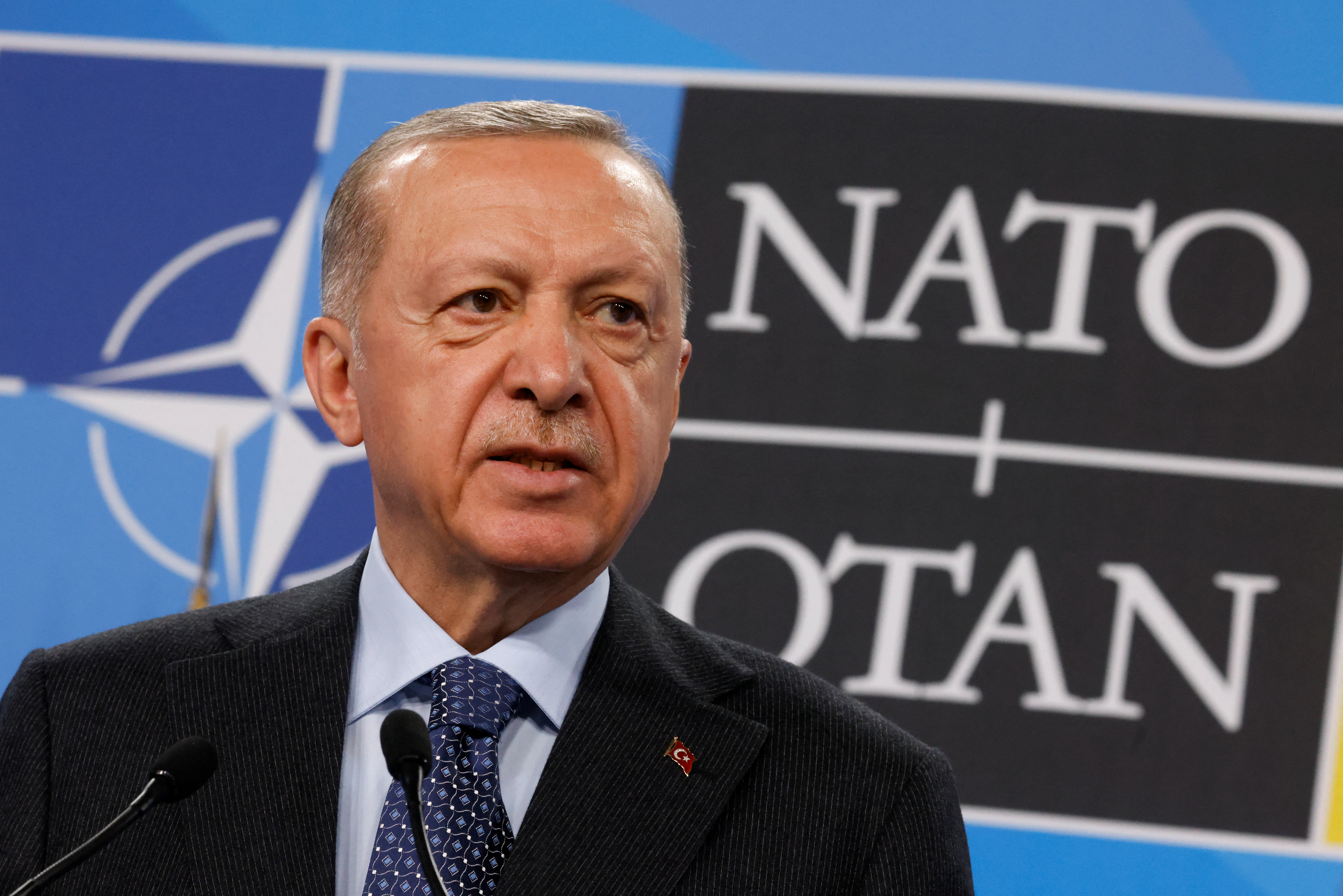 Turkey's President Recep Tayyip Erdogan speaks at a news conference during a NATO summit in Madrid, Spain June 30, 2022. REUTERS/Yves Herman