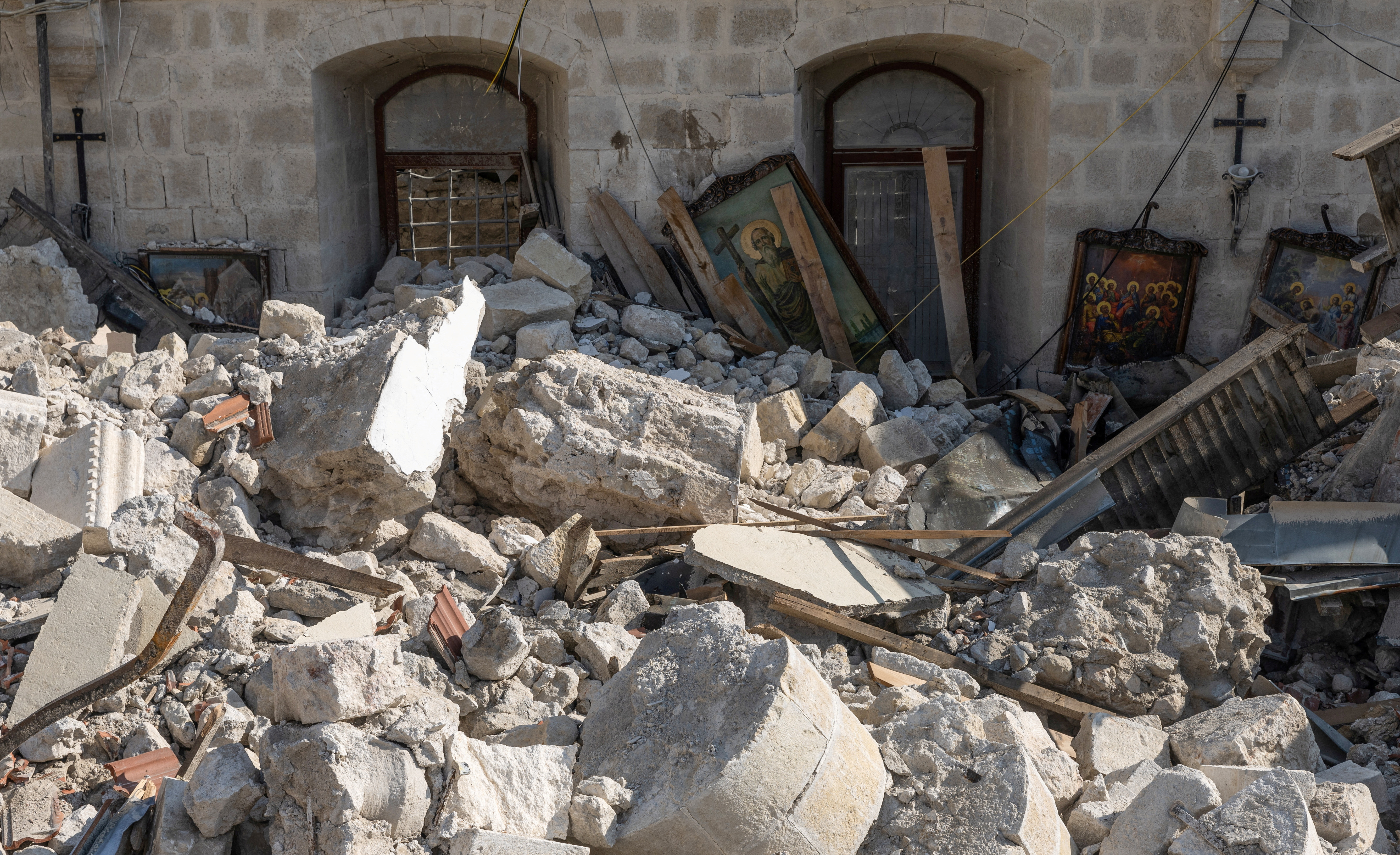 Icons are seen in the destroyed Greek Orthodox Church of Antioch