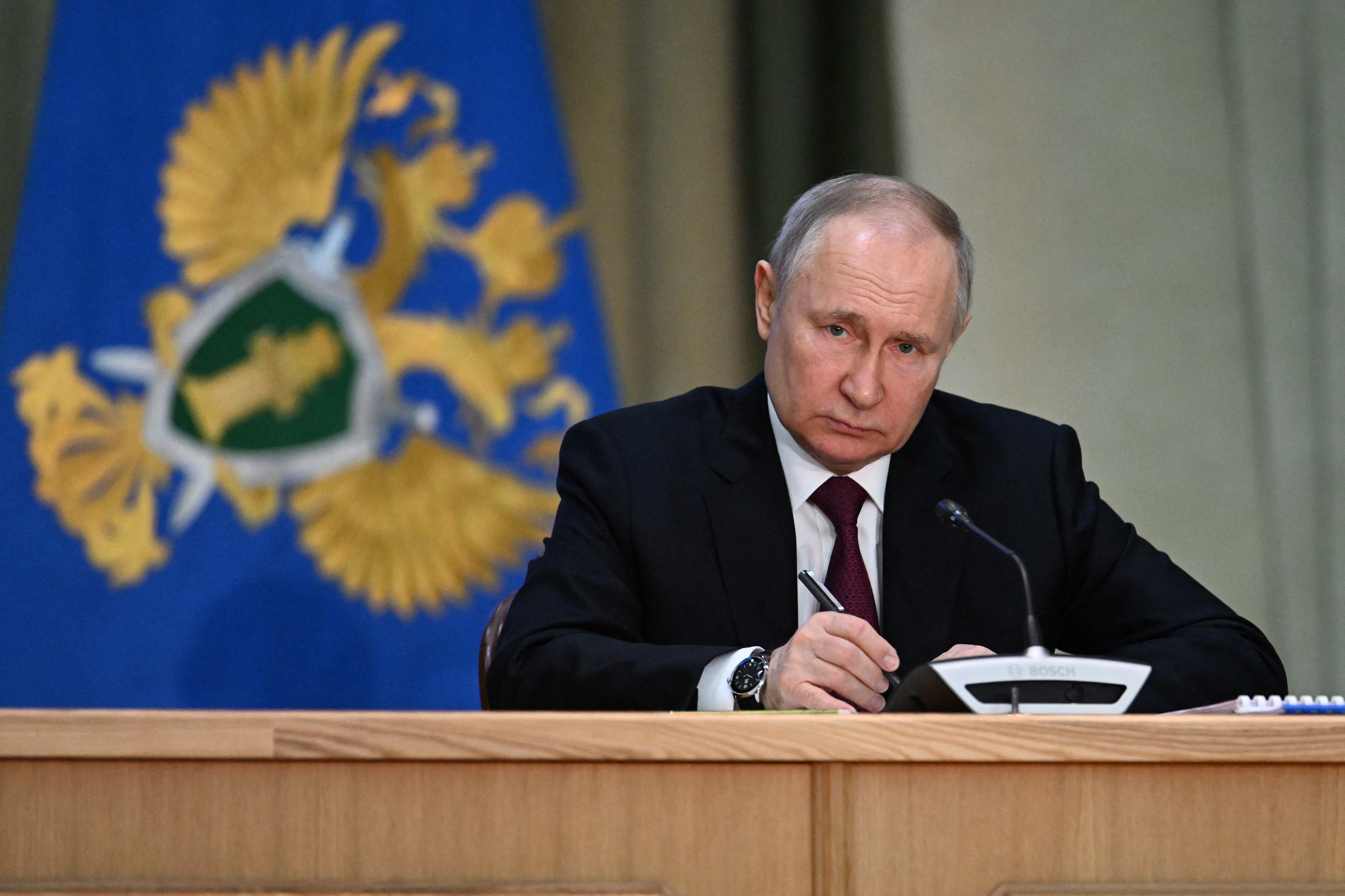 Russian President Vladimir Putin attends a meeting of the collegium of the Prosecutor General's office in Moscow, Russia, March 15, 2023.