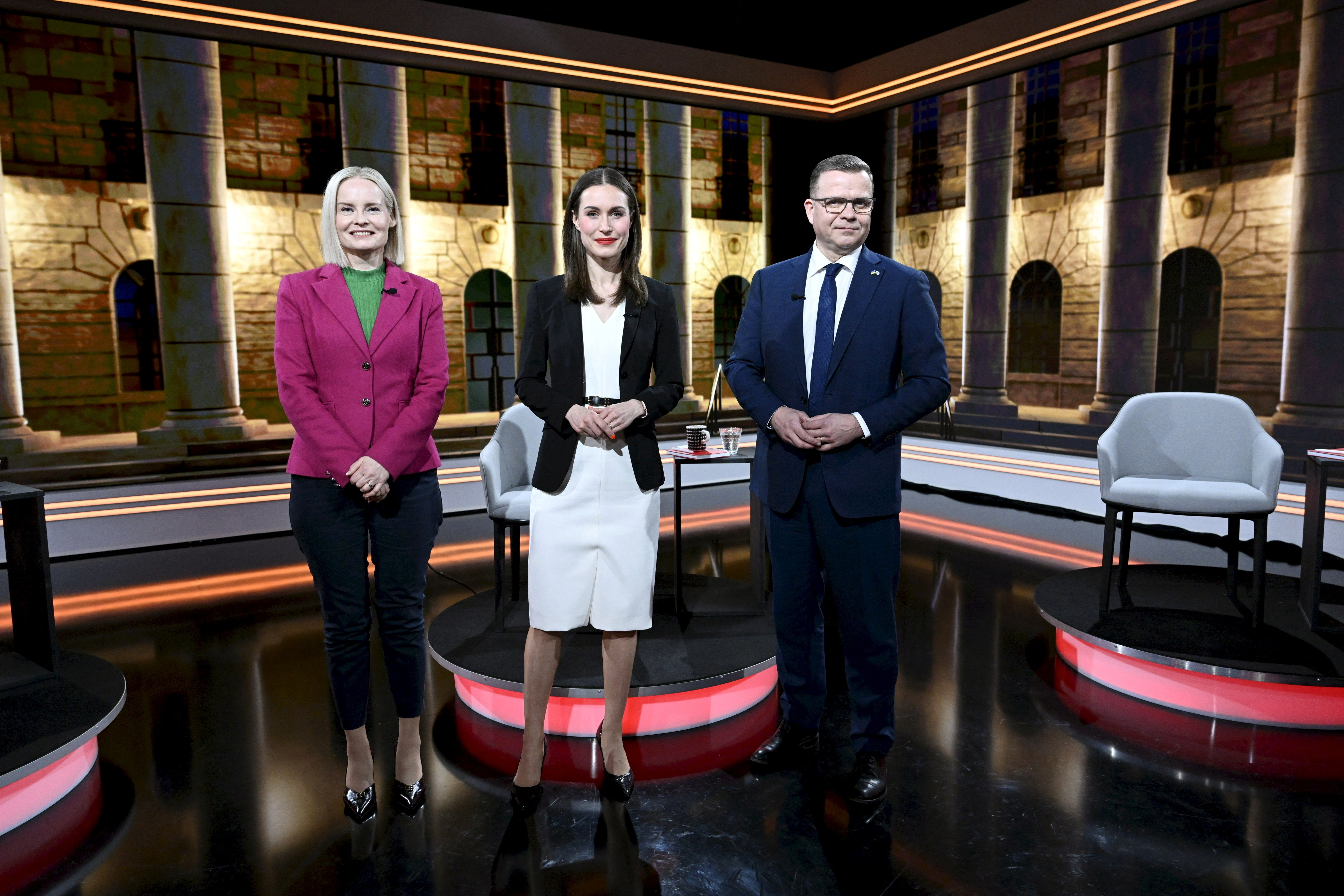 Chairperson of the Finns Party Riikka Purra, Chairperson of the SDP and current Prime Minister Sanna Marin and Chairperson of the National Coalition Party Petteri Orpo pose before the election debate, arranged by media company MTV, in Helsinki, Finland March 29, 2023. Lehtikuva/Markku Ulander via REUTERS ATTENTION EDITORS - THIS IMAGE WAS PROVIDED BY A THIRD PARTY. NO THIRD PARTY SALES. NOT FOR USE BY REUTERS THIRD PARTY DISTRIBUTORS. FINLAND OUT. NO COMMERCIAL OR EDITORIAL SALES IN FINLAND.