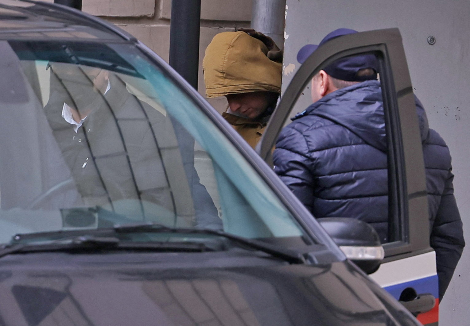 Reporter for U.S. newspaper The Wall Street Journal Evan Gershkovich, detained on suspicion of espionage, leaves a court building in Moscow, Russia March 30, 2023. REUTERS/Evgenia Novozhenina