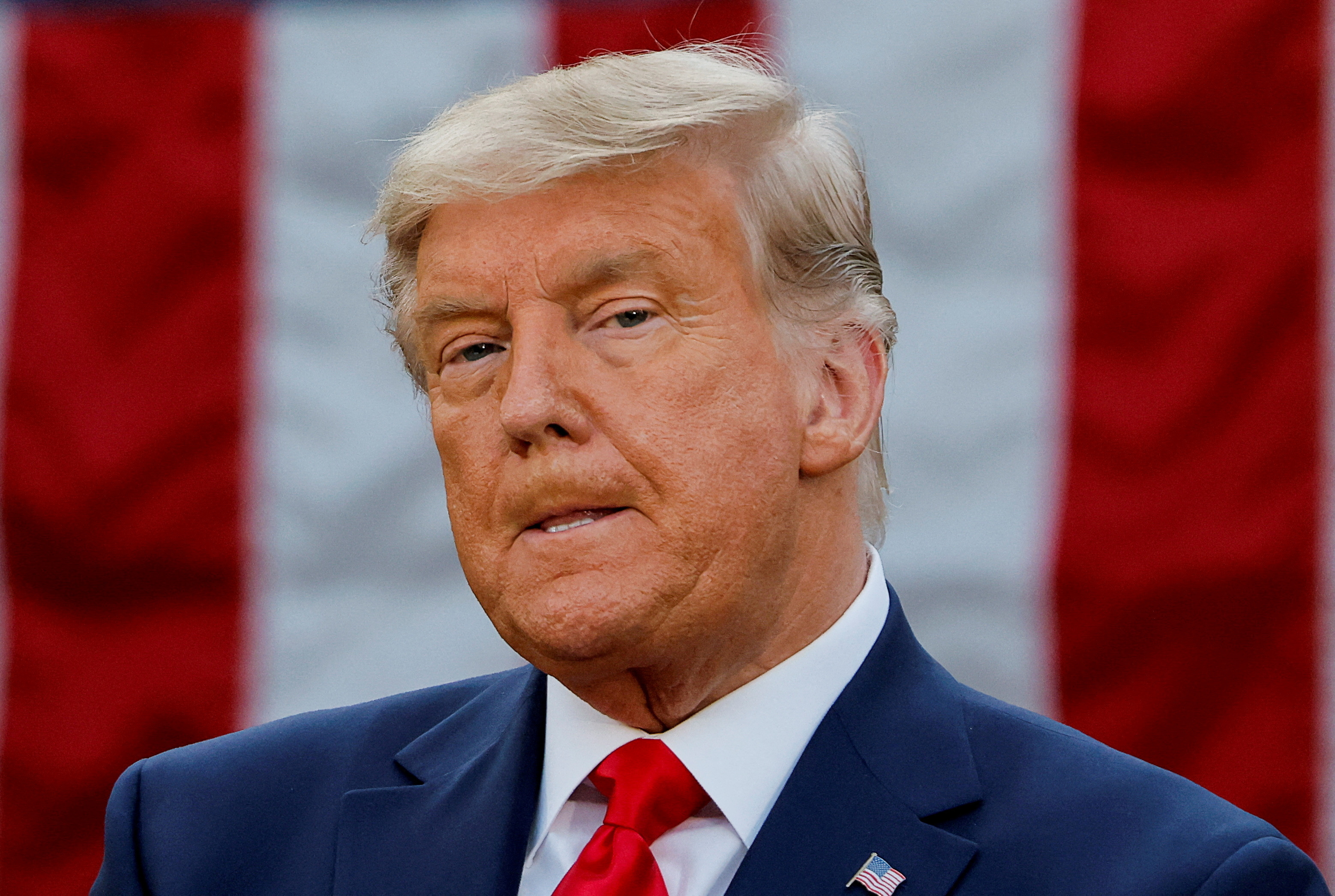 Donald Trump in front of American flag