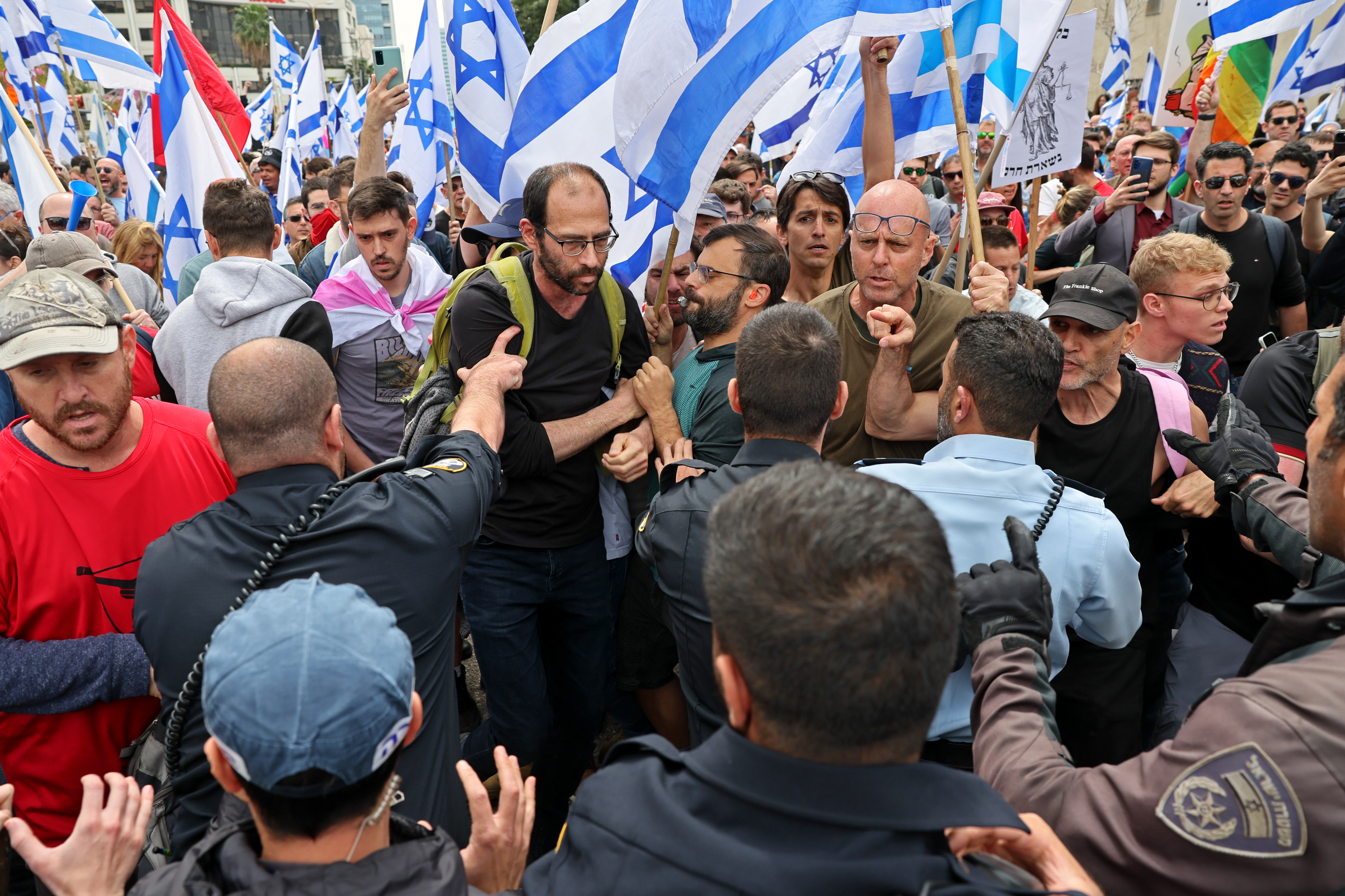 Israeli security forces confront protesters during ongoing demonstrations in Tel Aviv