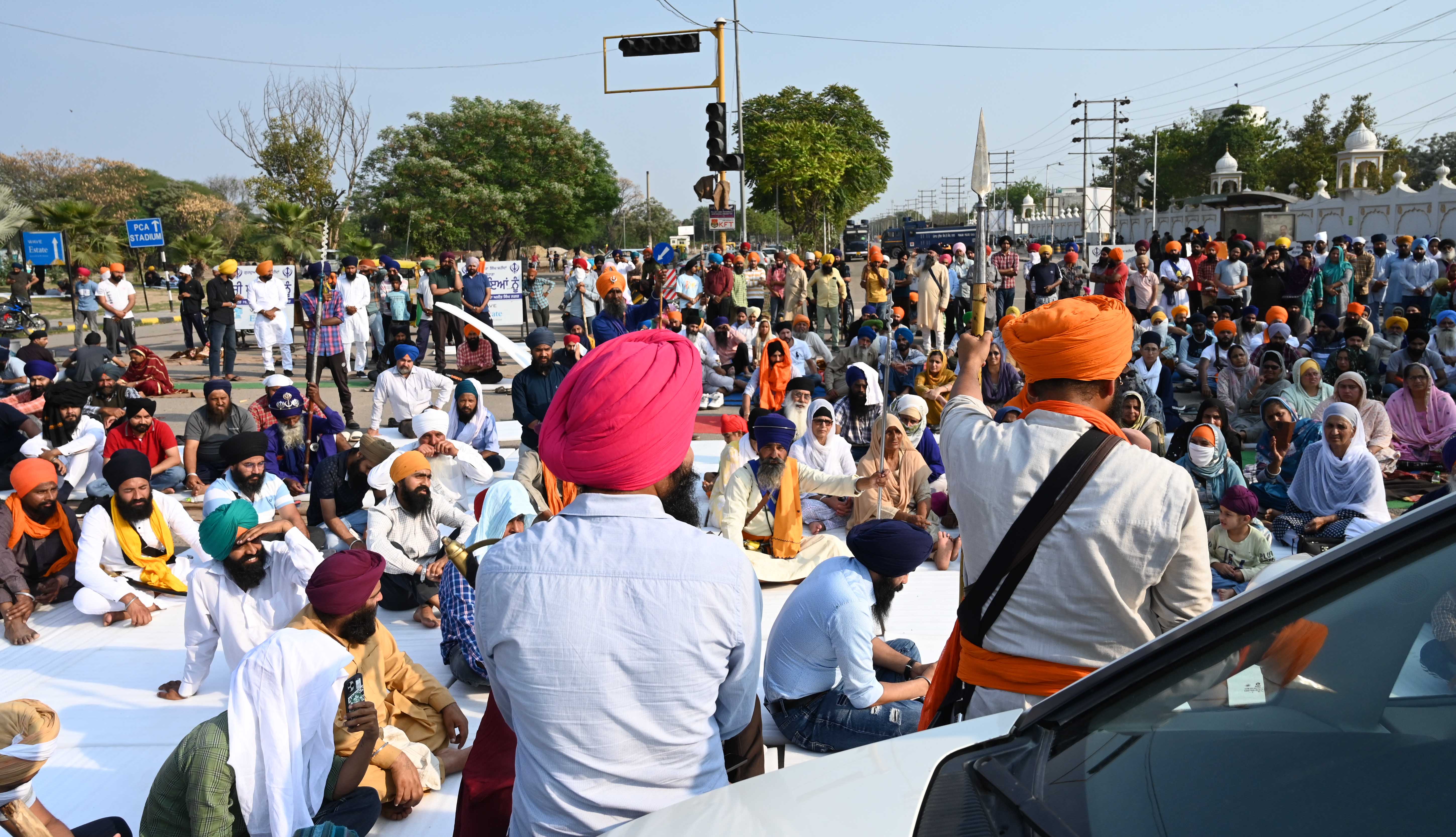 Singh’s supporters blocking the road in front of a Sikh temple in Mohali, Punjab on Sunday