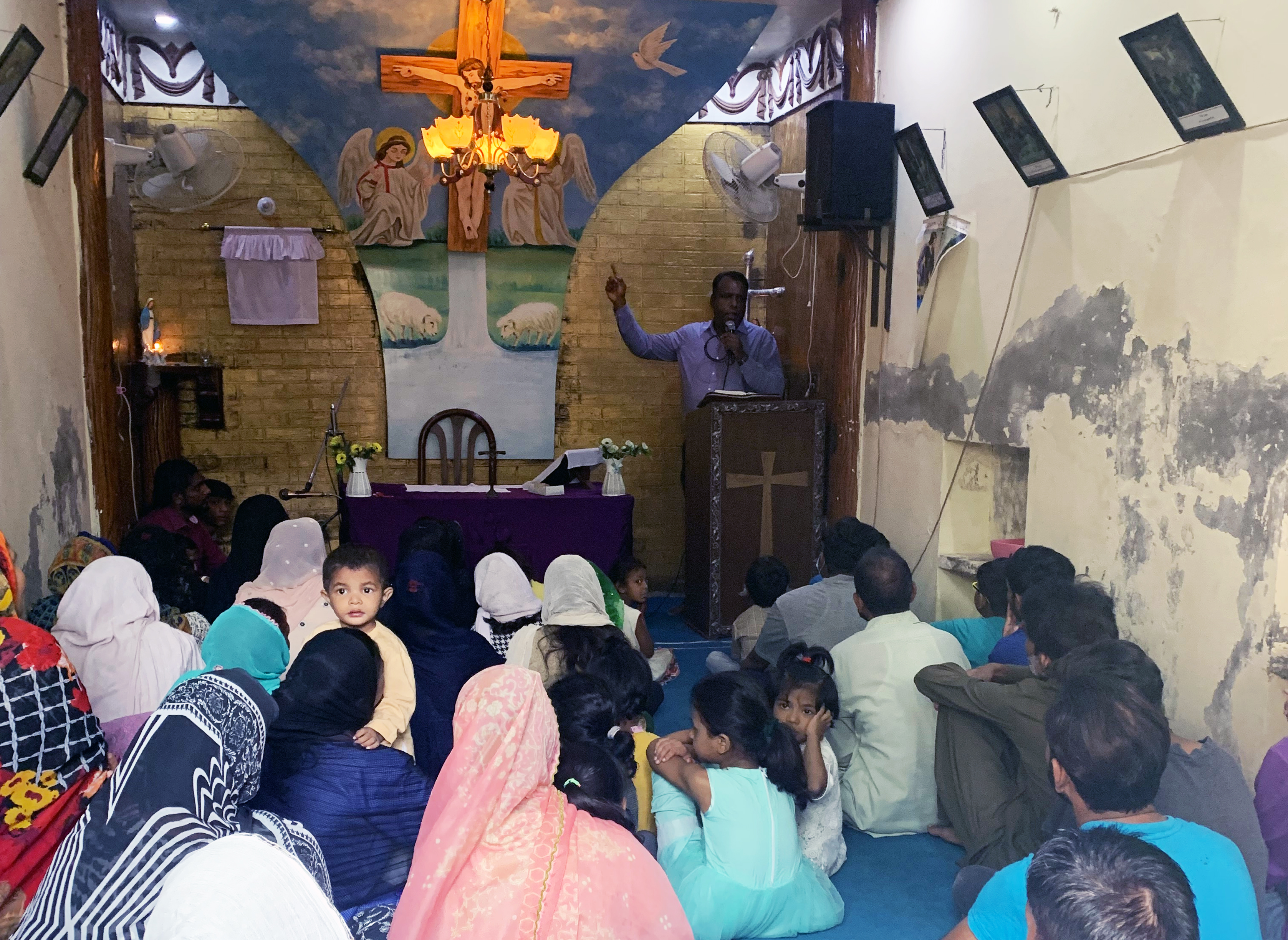 A photo of a group of people at a church.