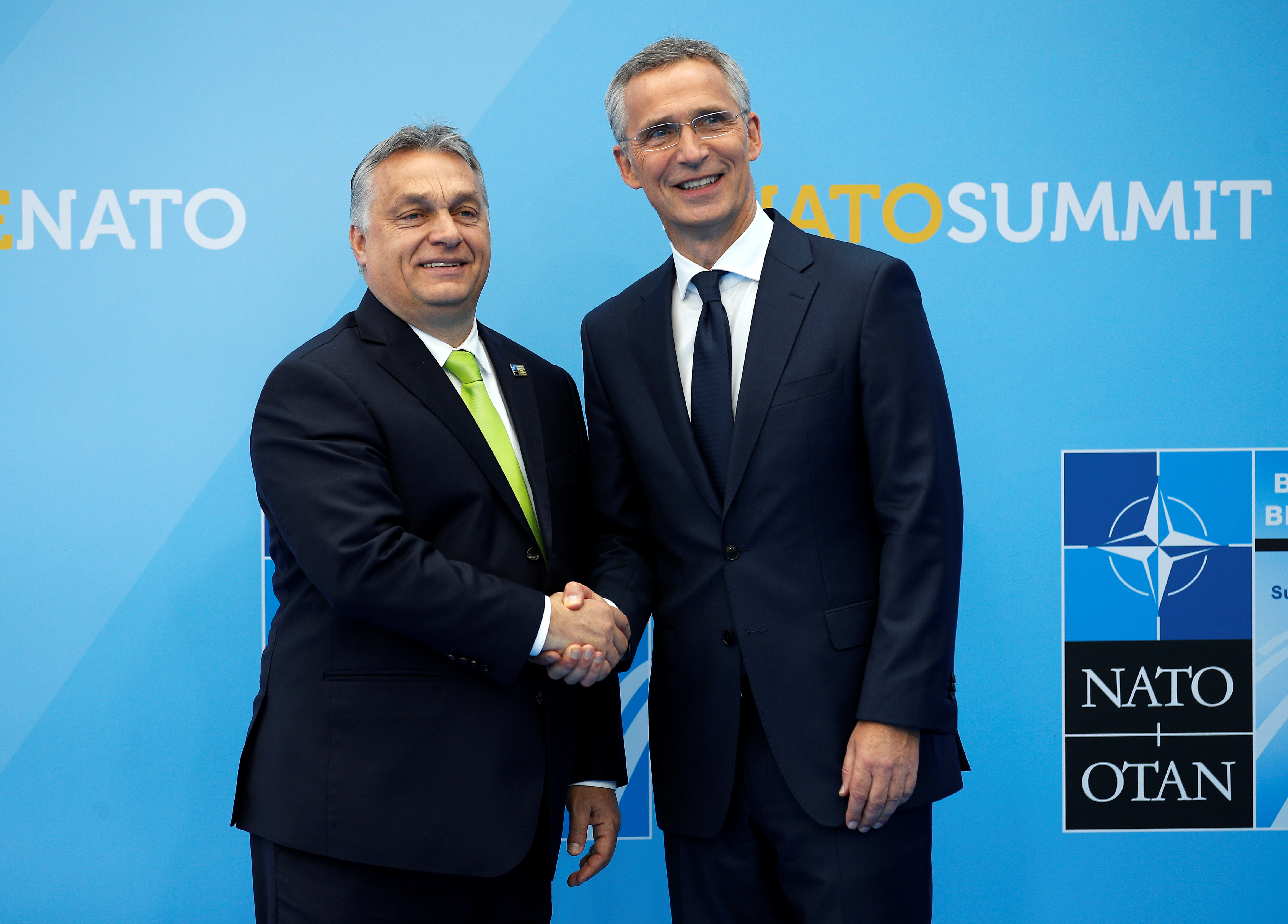 Hungarian Prime Minister Viktor Orban is greeted by NATO Secretary General Jens Stoltenberg before a summit of heads of state and government at NATO headquarters in Brussels, Belgium July 11, 2018. Francois Mori/Pool via REUTERS