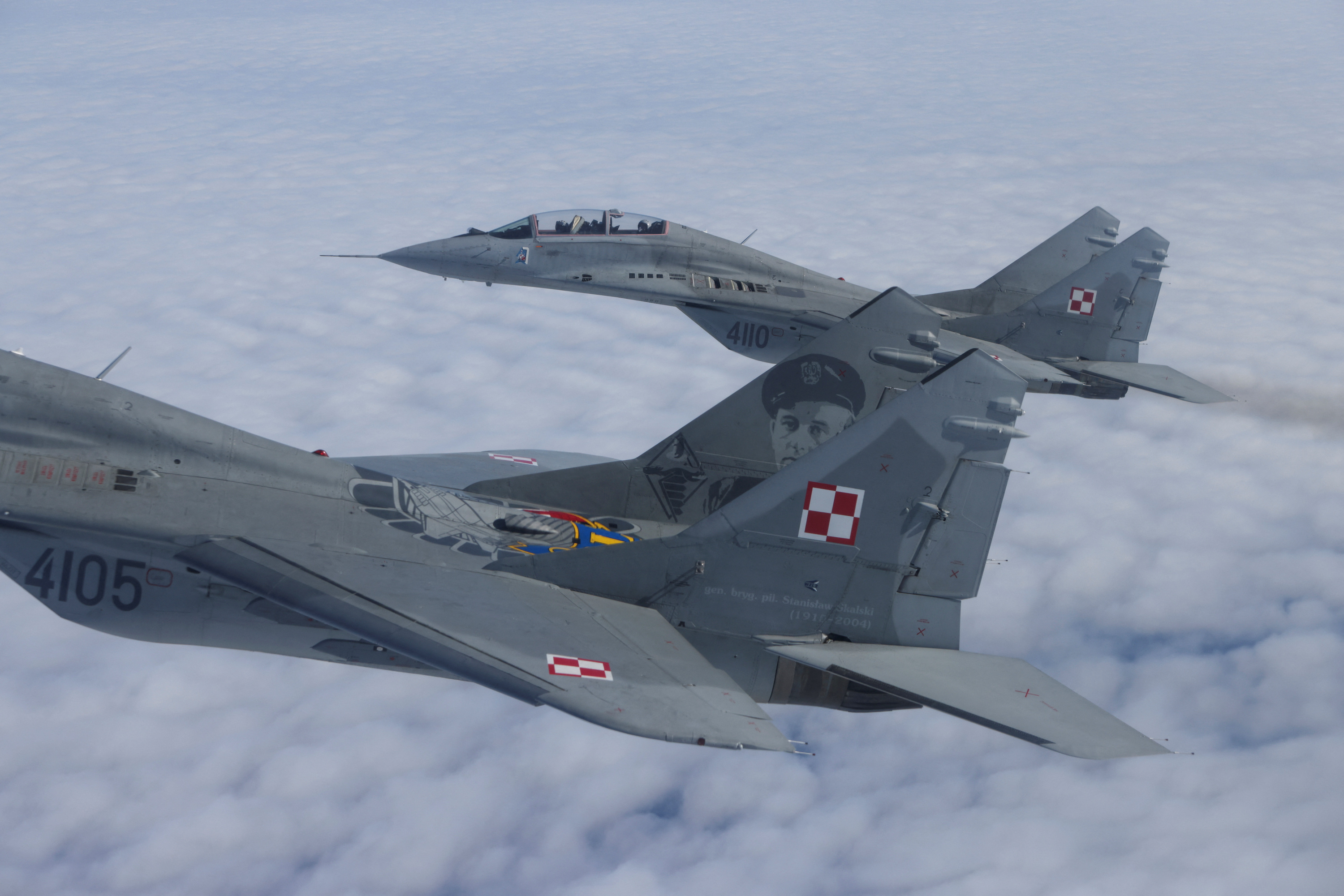MiG-29 aircrafts fly during a NATO media event at an airbase in Malbork, Poland.