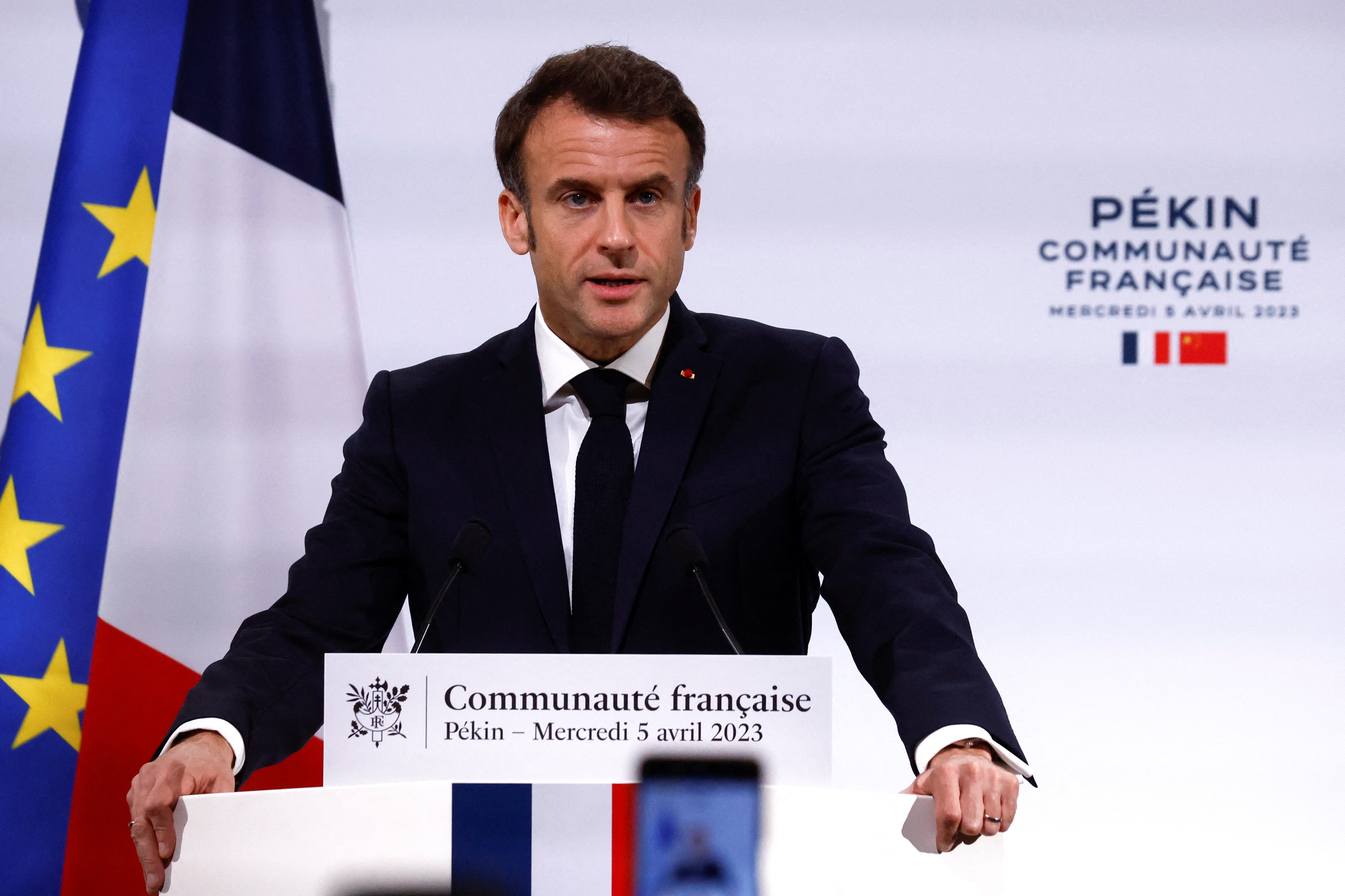 French President Emmanuel Macron delivers a speech as he meets the French community in Beijing, China