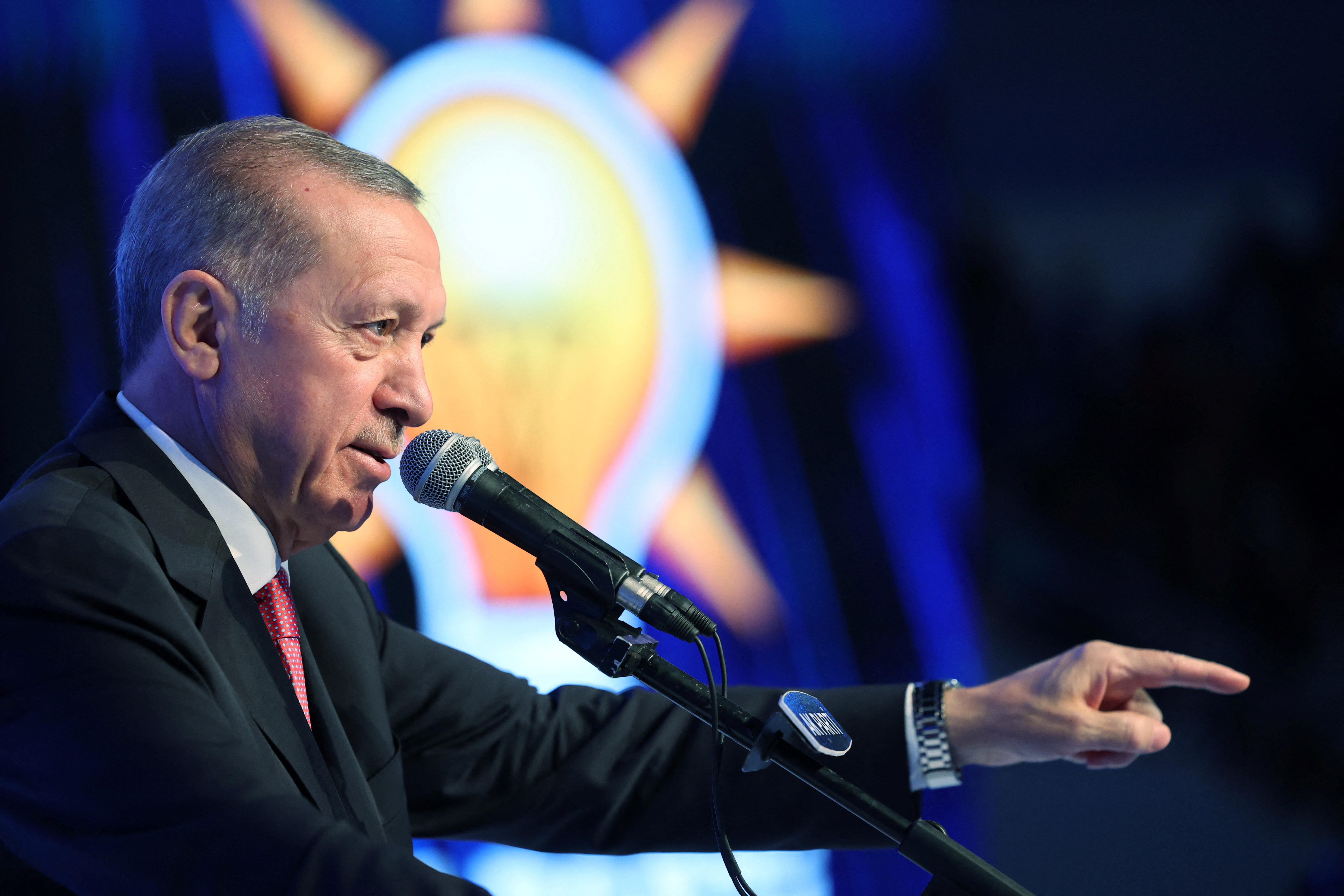 Turkish President Tayyip Erdogan makes a speech during a meeting of his ruling AK Party to announce the party's election manifesto ahead of the May 14 elections