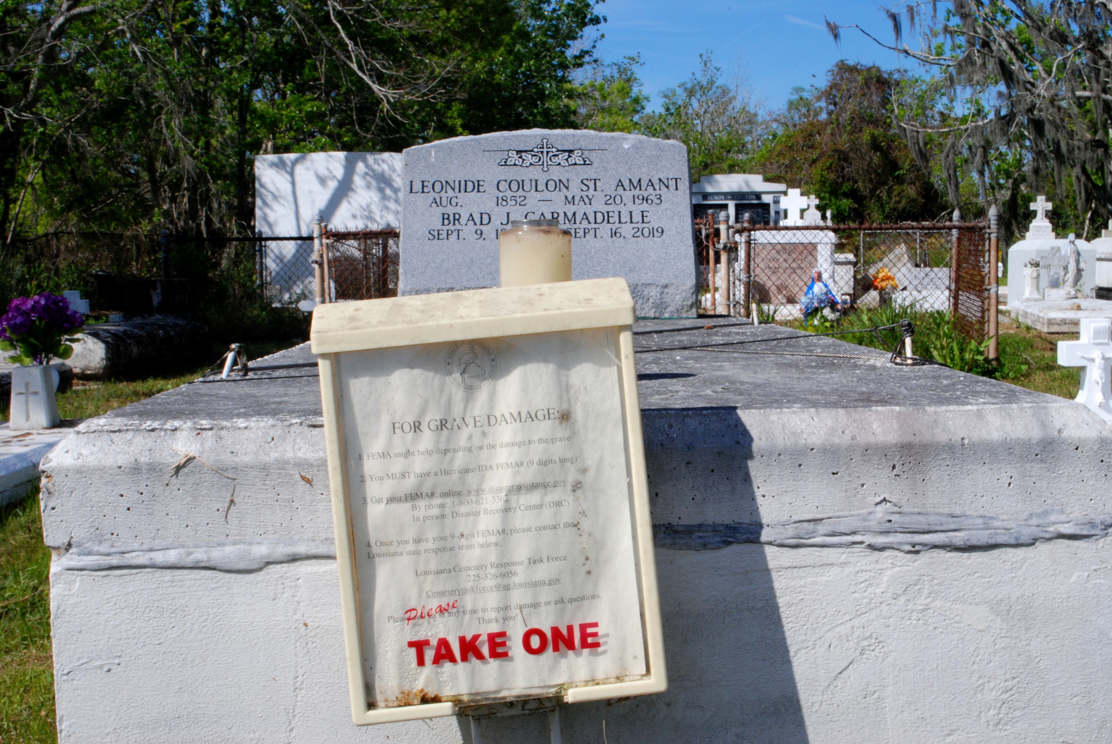 Following Ida, a water-stained notice in Barataria’s Little Village Cemetery advises residents to call FEMA about grave damage