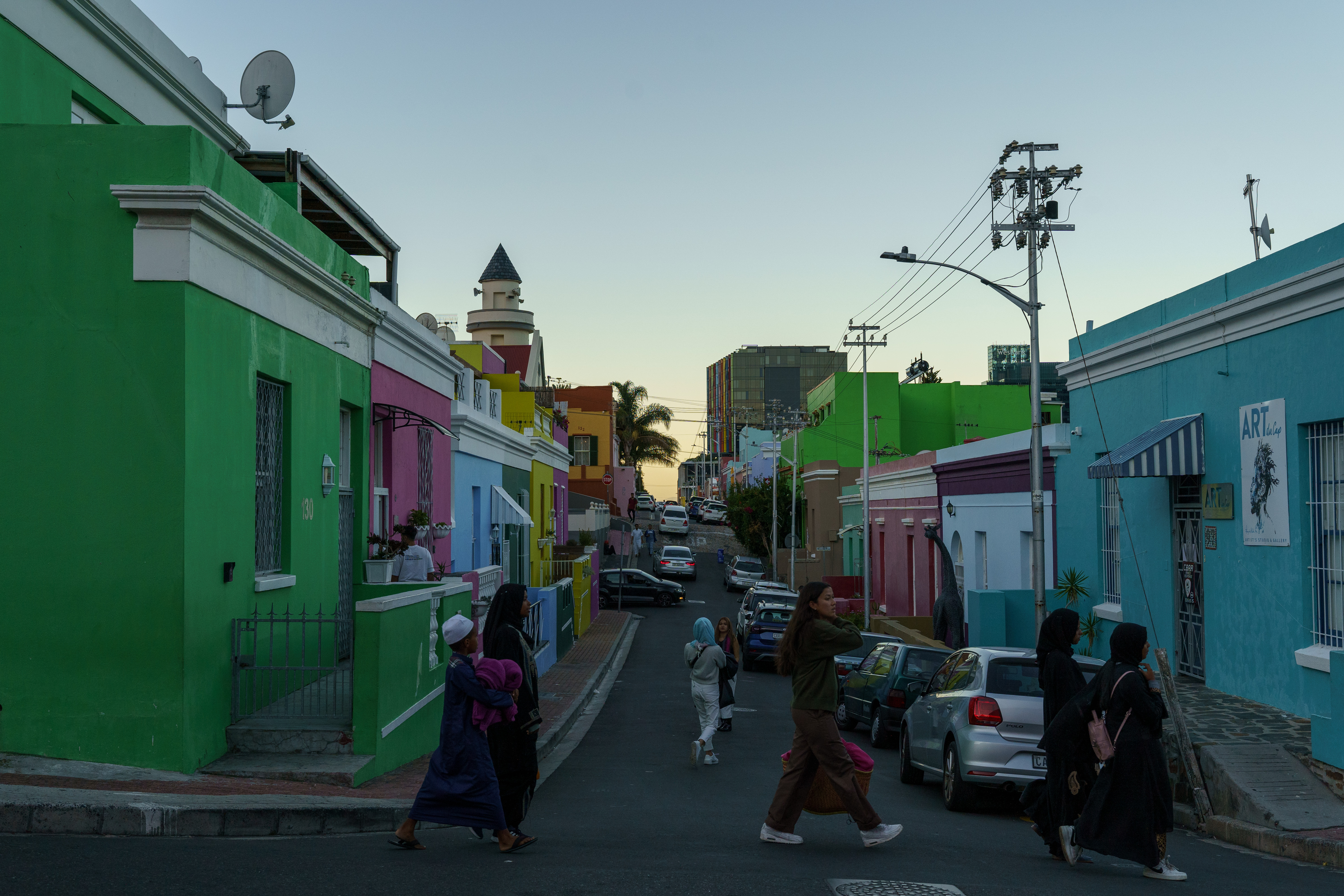 People walk along the streets of Bo-Kaap, not far from the first mosque ever built in South Africa
