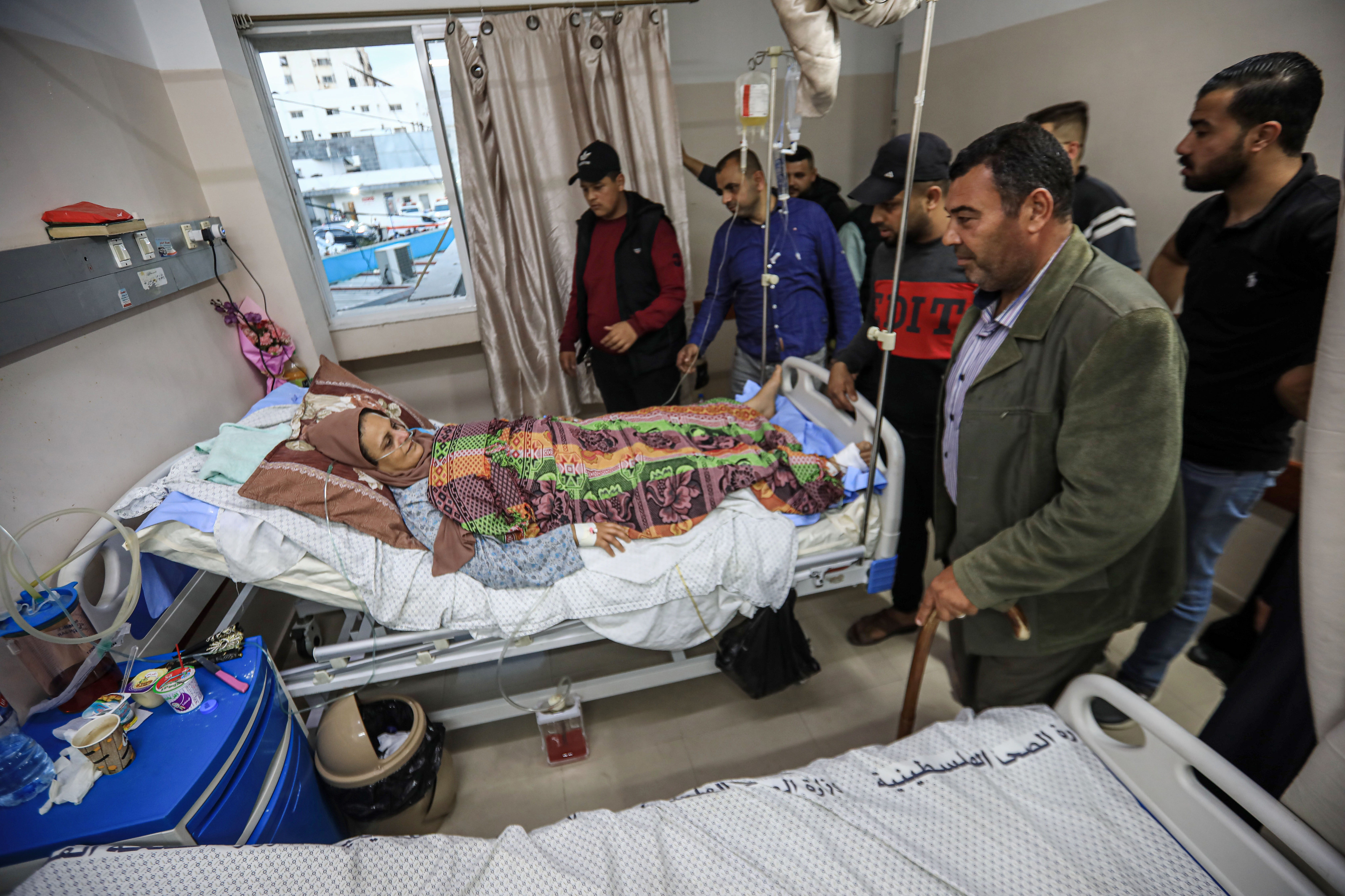 Najwa is surrounded by family at Al-Shifa Hospital in Gaza City. Her eldest son Ramzi Abu Aisha, 28, says when they heard the neighbours scream, ‘We never thought my mother was the one injured. She had gone up to the roof just a few moments before’