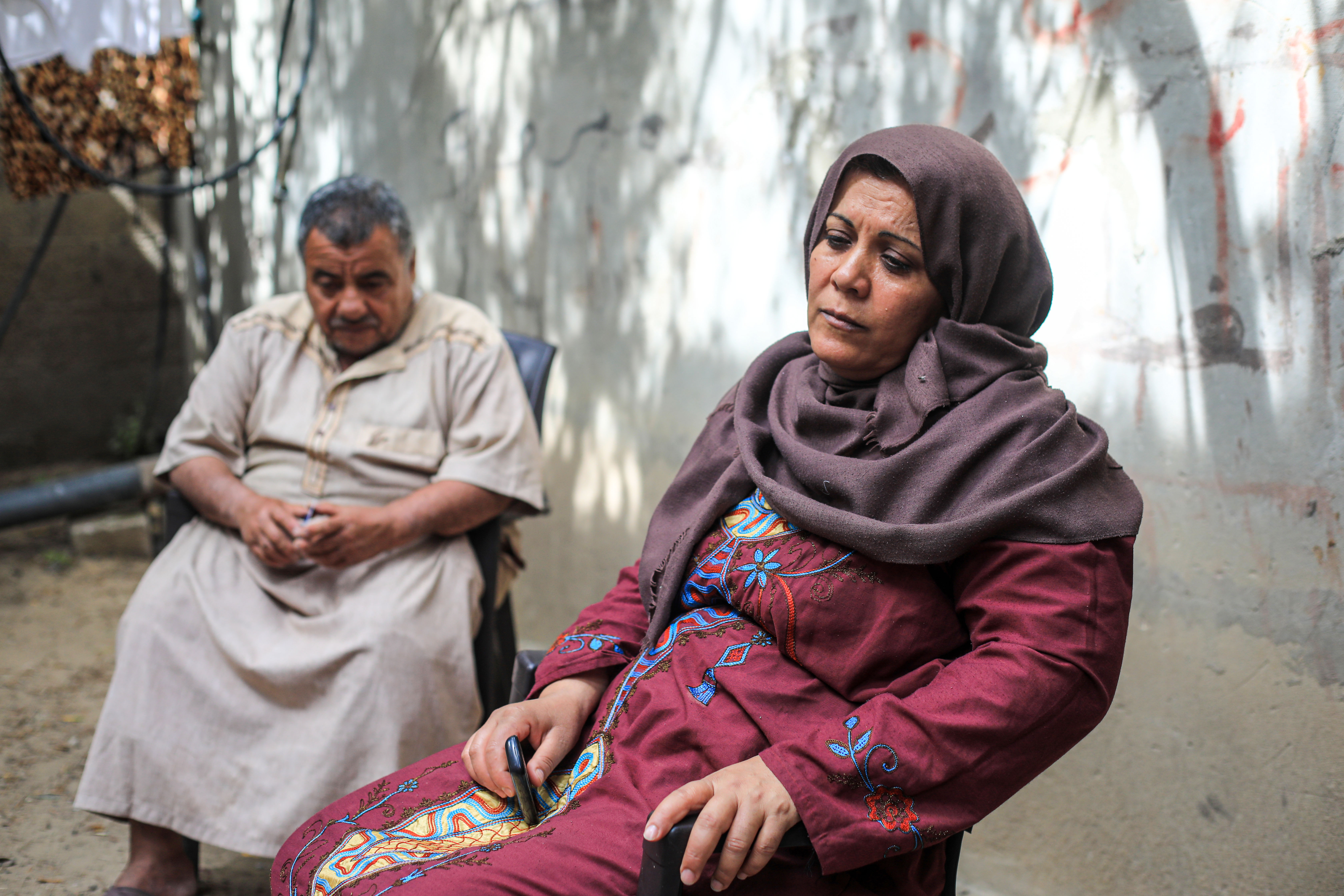 Samah al-Qanou and her husband whose food aid voucher was suspended by WFP