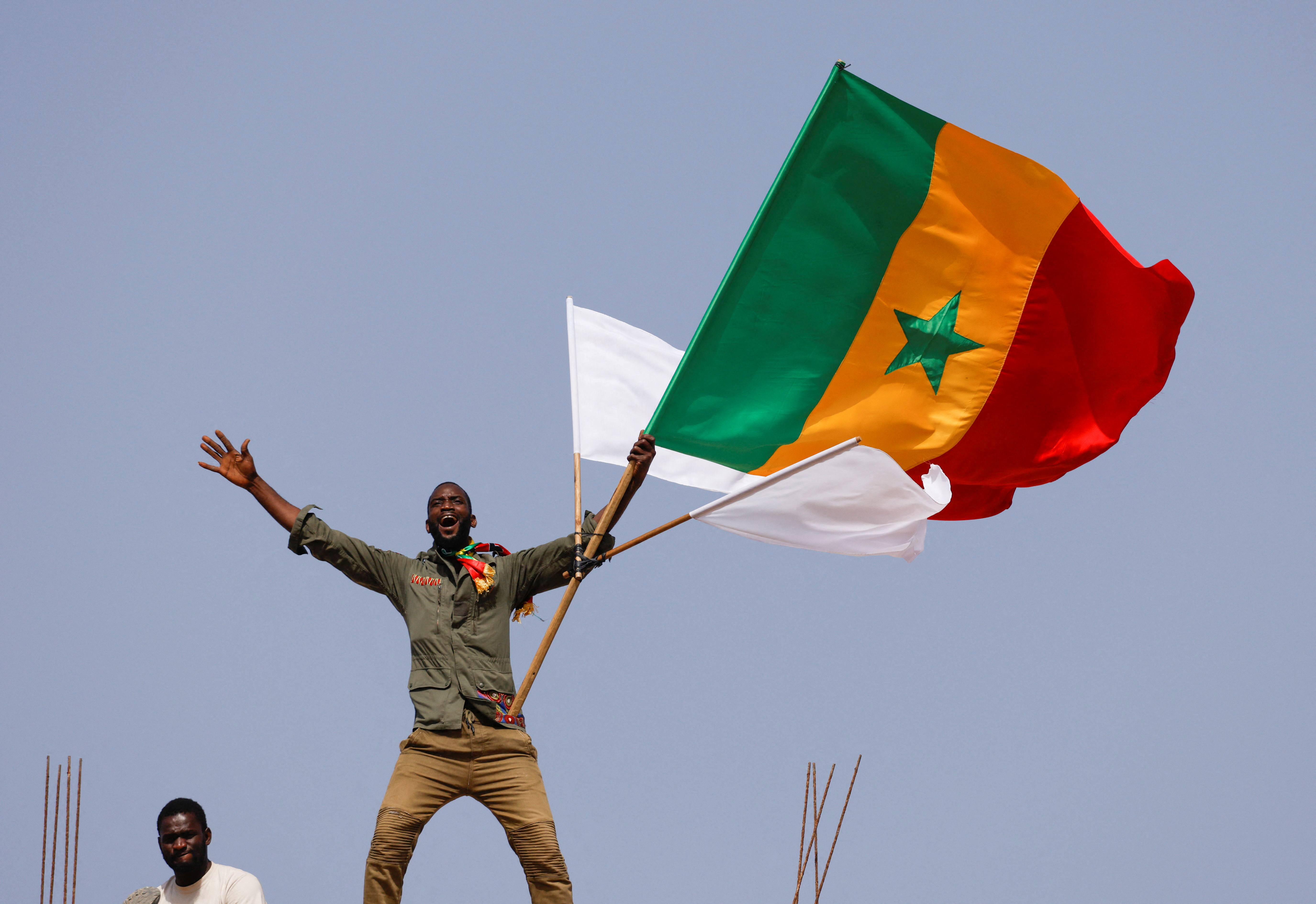 A supporter of Senegalese opposition leader Ousmane Sonko reacts during a protest to demand the release of alleged political prisoners in Dakar, Senegal, March 14, 2023