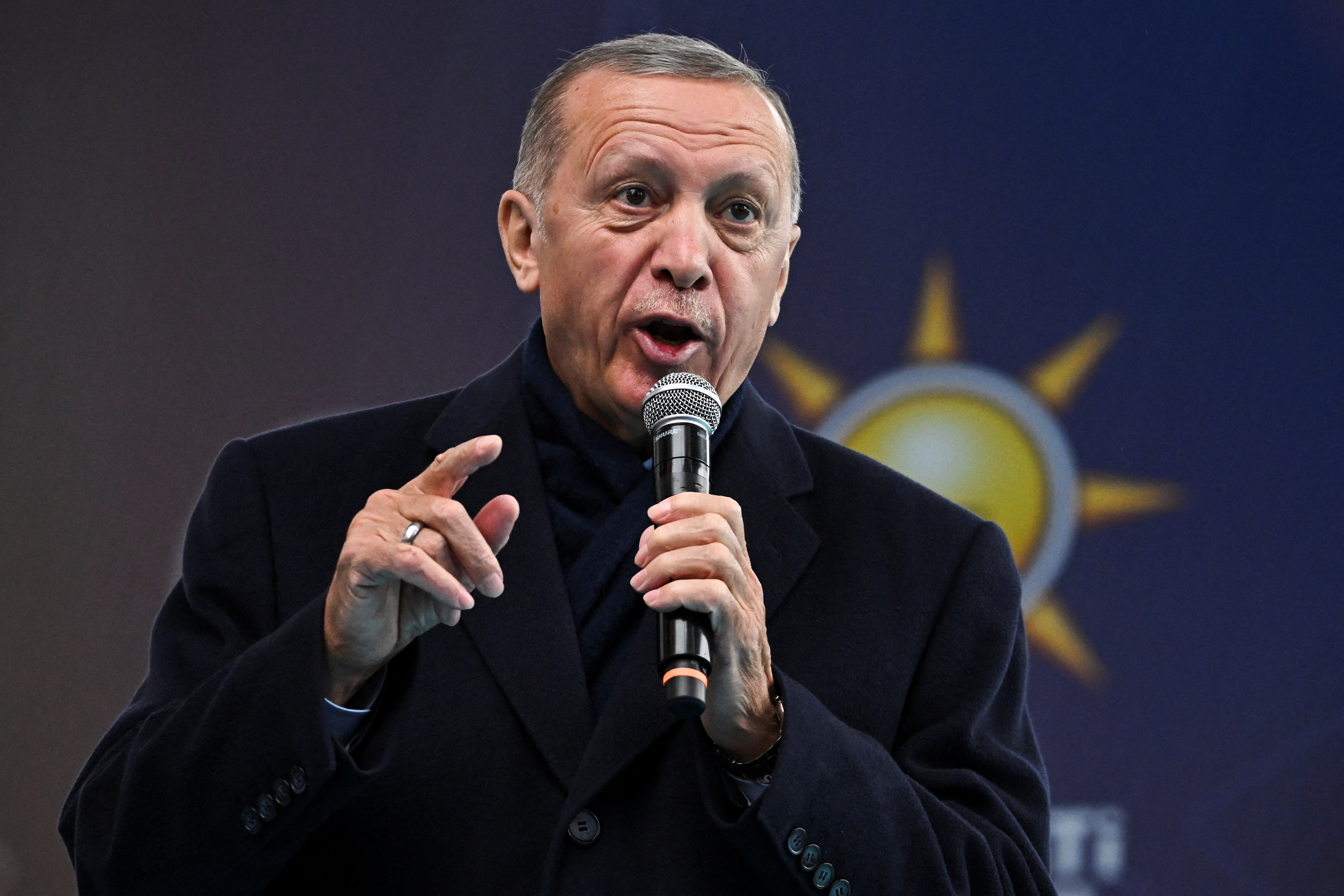 Turkish President Tayyip Erdogan addresses his supporters during a rally ahead of the May 14 presidential and parliamentary elections