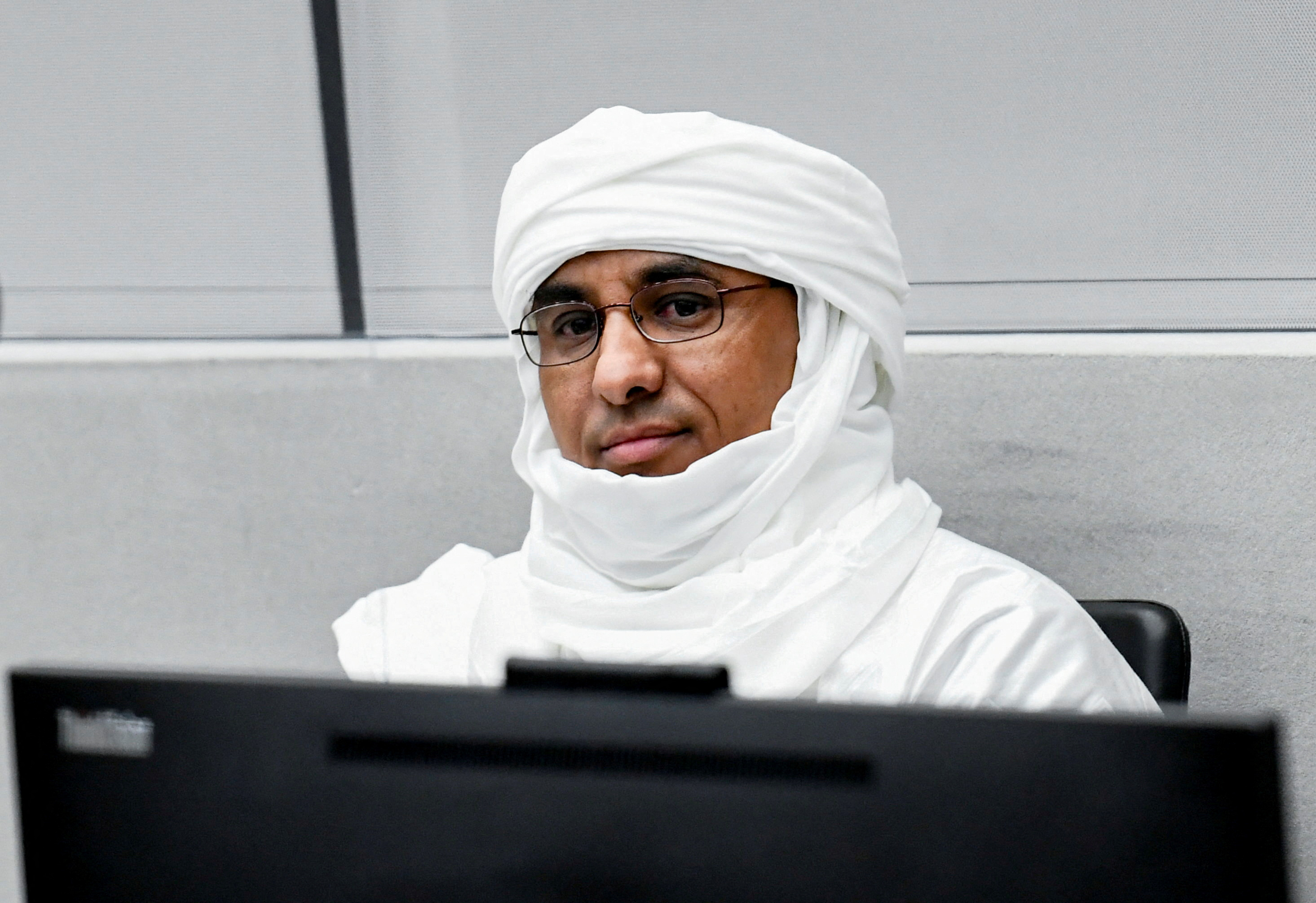 Al Hassan Ag Abdoul Aziz Ag Mahmoud, a Malian rebel, attends his war crimes trial at the International Criminal Court (ICC)
