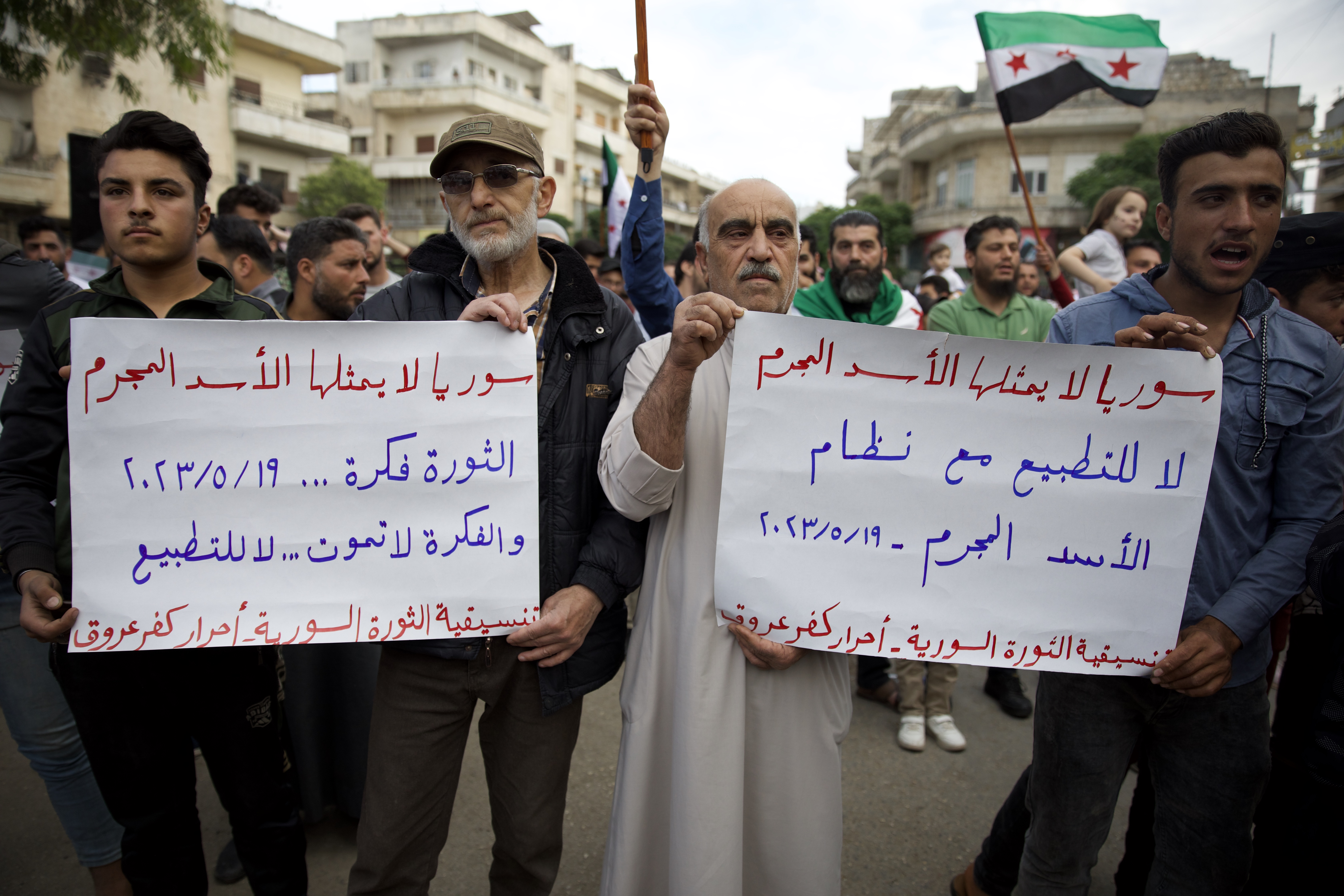 Protesters held banners that read: ‘Syria is not represented by the criminal al-Assad’ and ‘No to normalisation with the regime’ in rebel-held Idlib