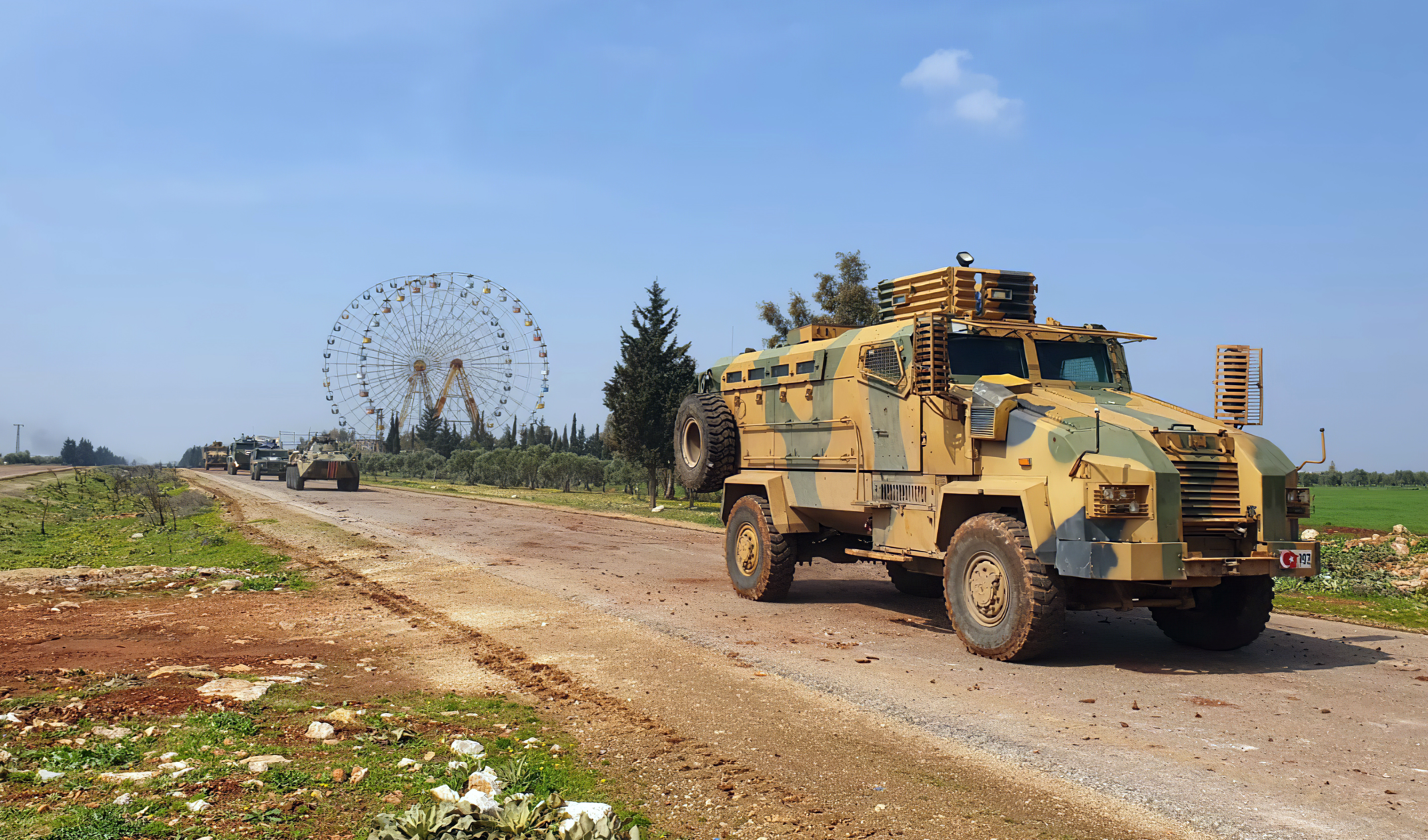 A Turkish armoured vehicle leading a joint patrol with Russia along Syria's M4 highway.