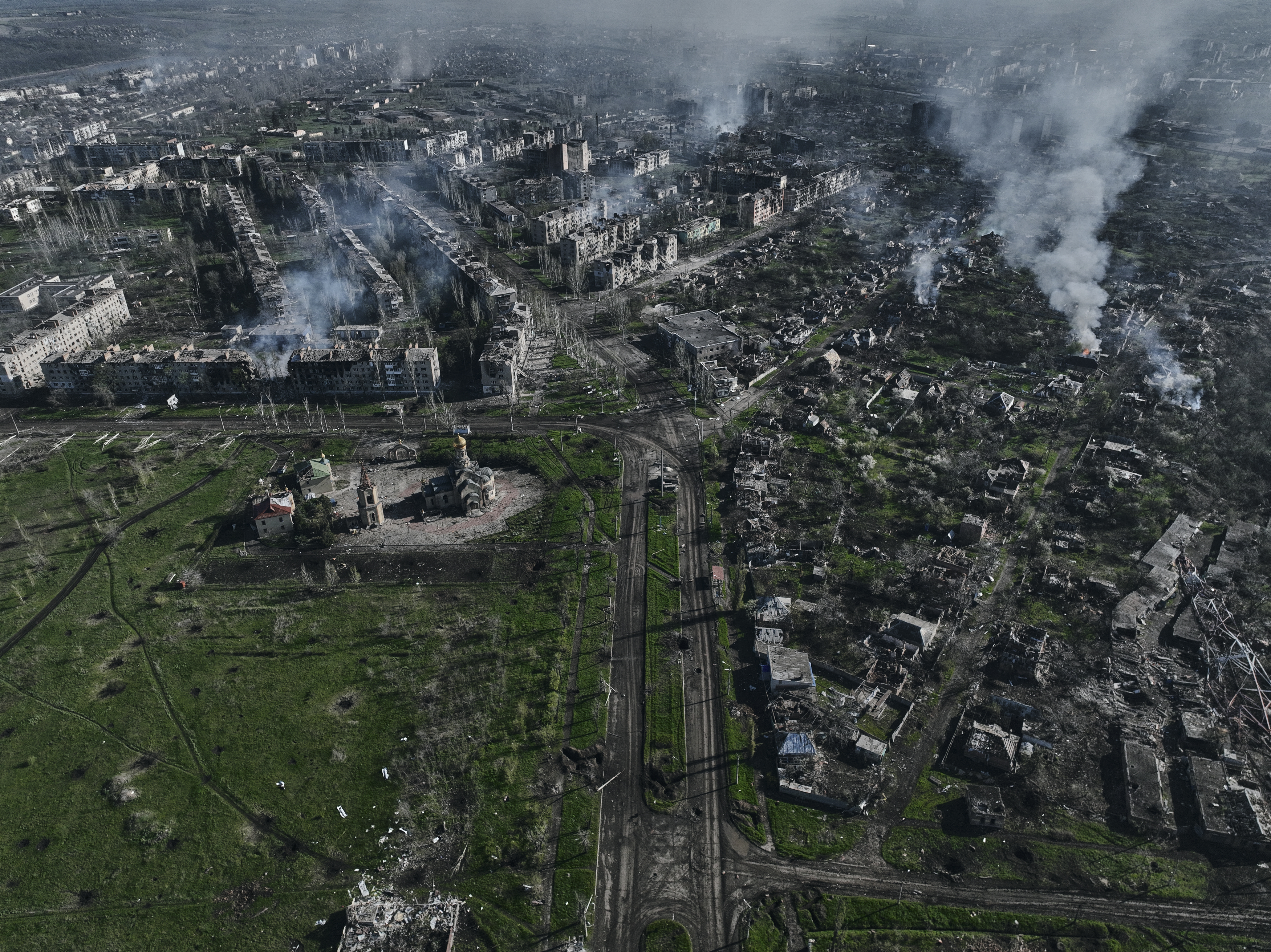 Smoke rises from buildings in this aerial view of Bakhmut, the site of Ukraine’s heaviest battles with Russian troops in the Donetsk region of Ukraine, on April 26, 2023