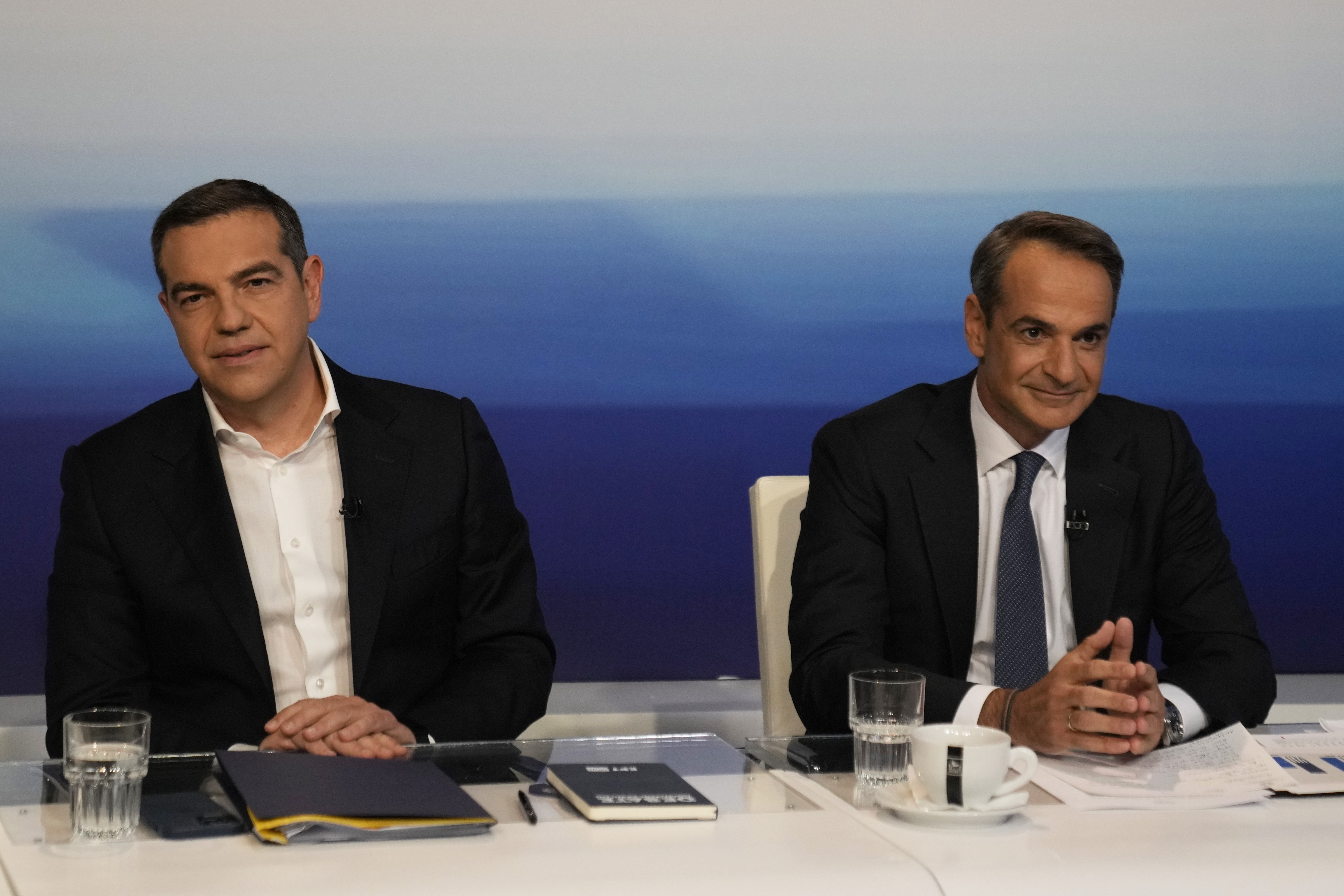 Prime Minister and Néa Dimokratía leader Kyriakos Mitsotakis, right,and leader of the main opposition Syriza party, Alexis Tsipras, ahead of a televised debate last week