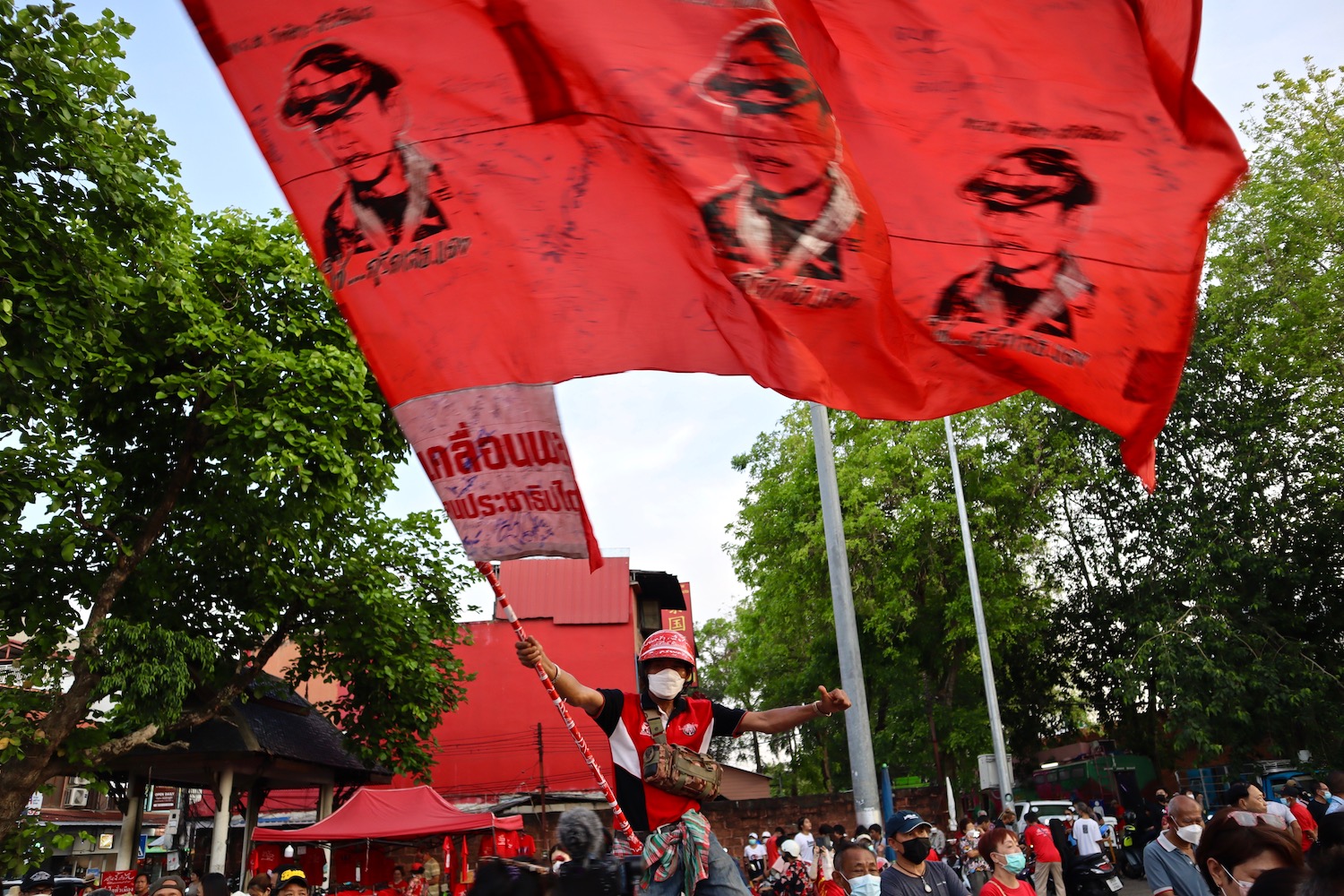 Pheu Thai supporters gather at a campaign rally in Chiang Mai