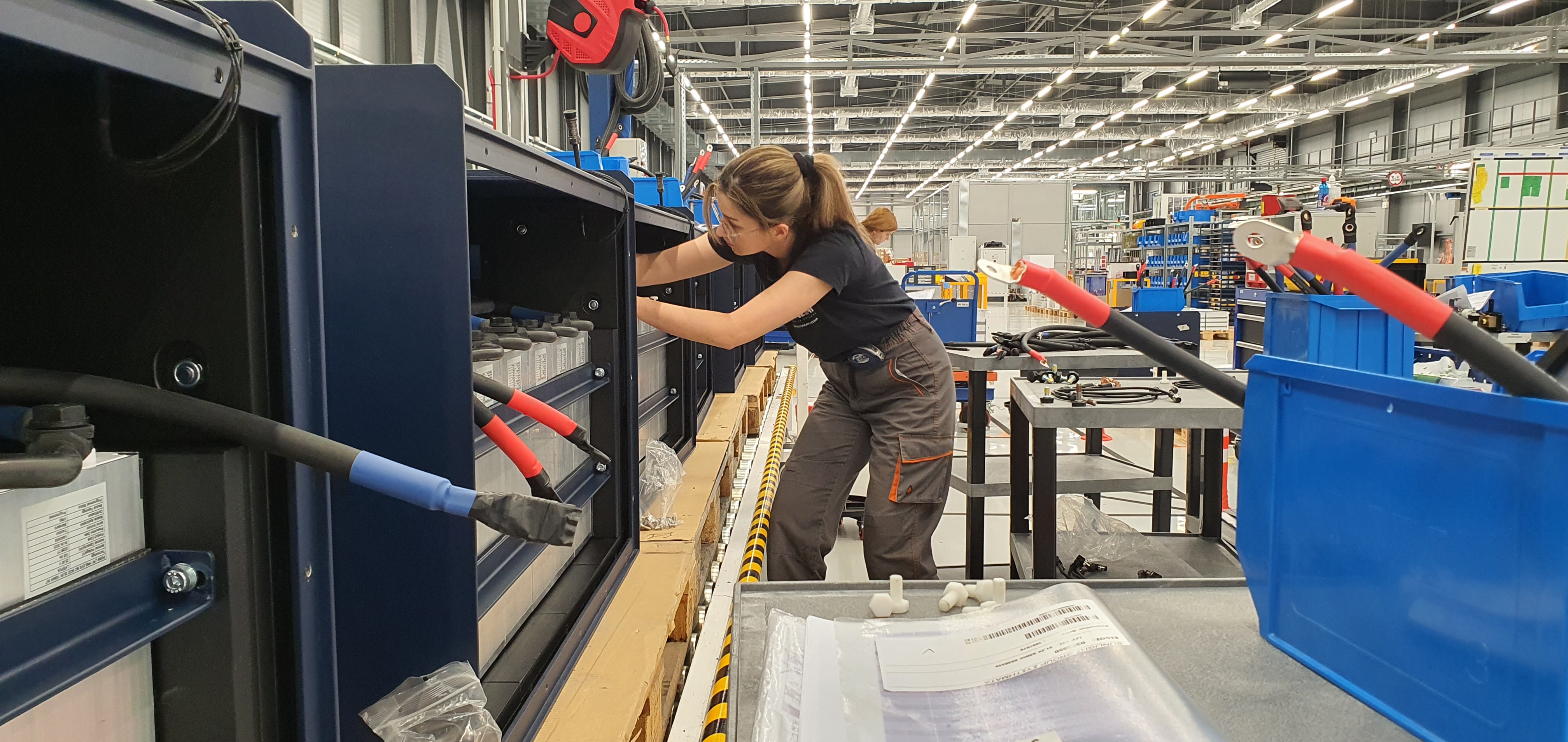 An employee assembles a forklift battery at the Sunlight factory in Xanthi, northern Greece [John Psaropoulos]