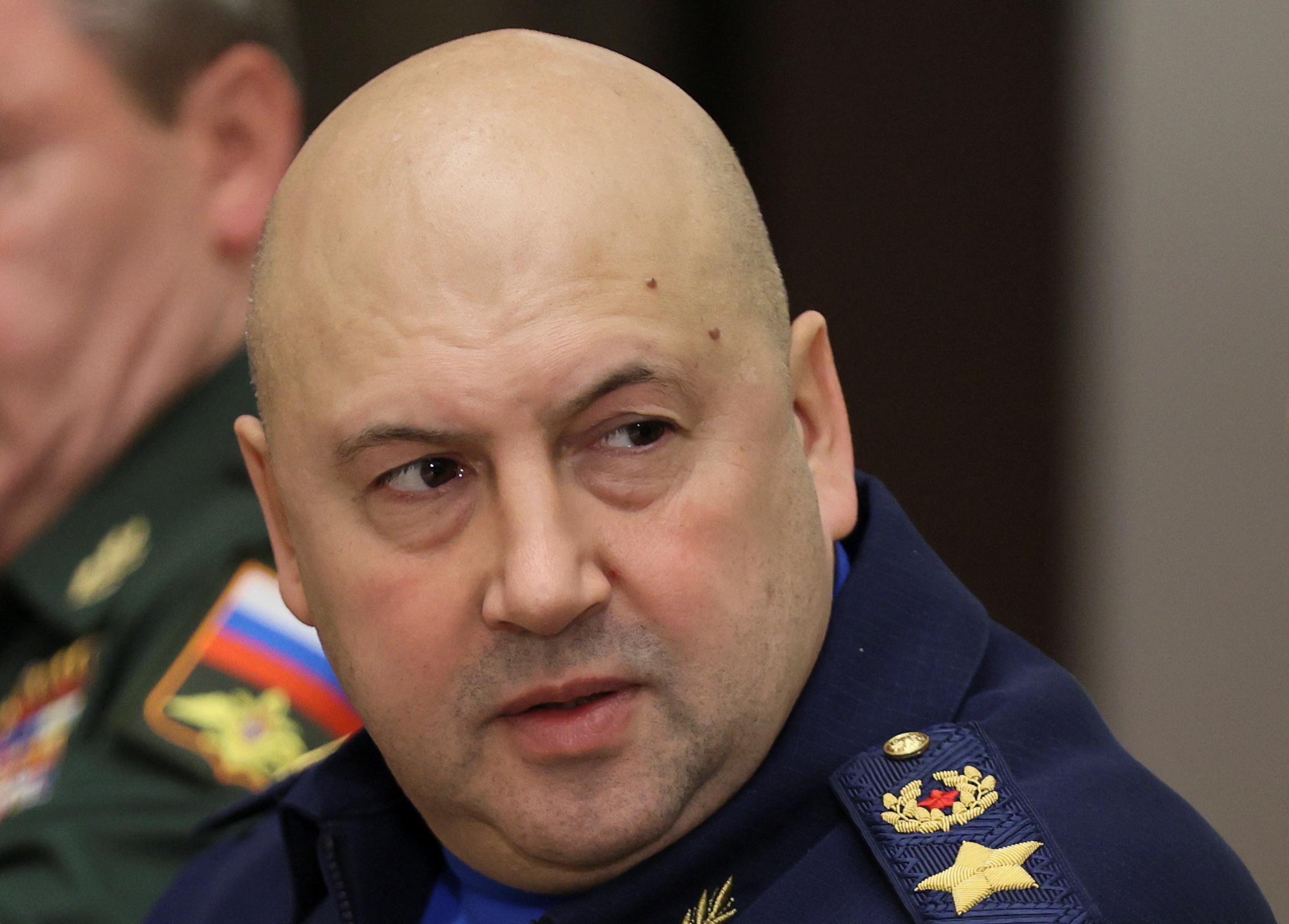 Commander of Russia's Aerospace Forces Sergei Surovikin attends a meeting with President Vladimir Putin in Sochi, Russia, November 3, 2021. Sputnik/Mikhail Metzel/Pool via REUTERS ATTENTION EDITORS - THIS IMAGE WAS PROVIDED BY A THIRD PARTY. THIS PICTURE WAS PROCESSED BY REUTERS TO ENHANCE QUALITY. AN UNPROCESSED VERSION HAS BEEN PROVIDED SEPARATELY.