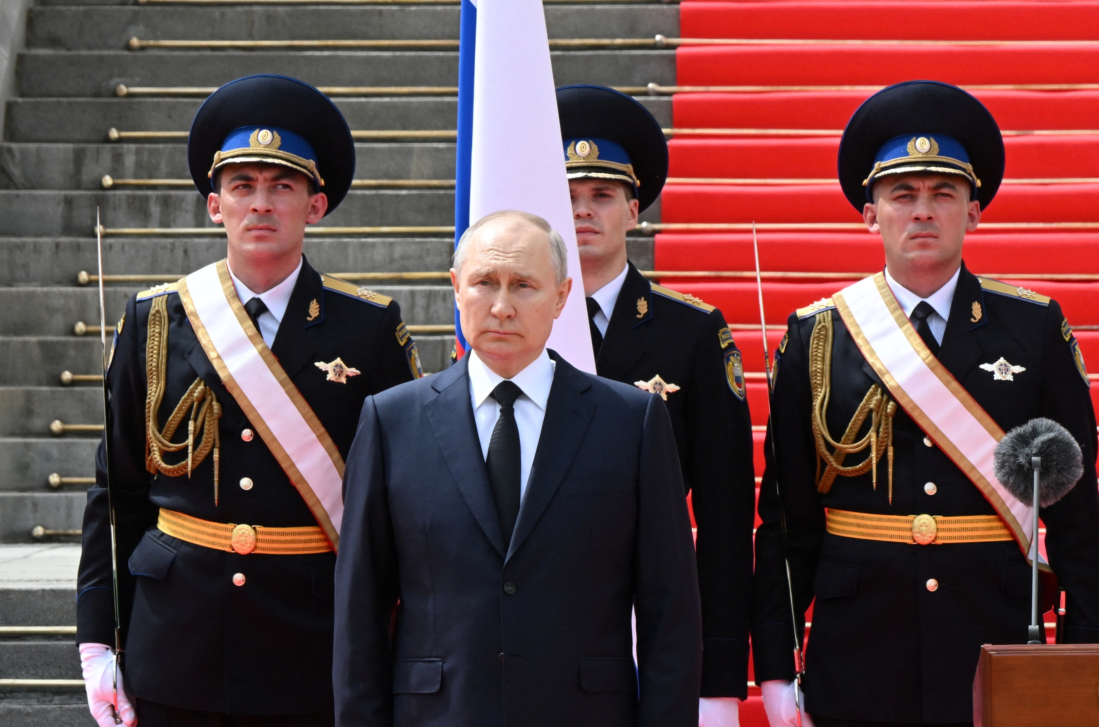 Russian President Vladimir Putin stands in front of members of Russian military units, the National Guard and security services during his address to pay honour to armed forces, that upheld order during recent mutiny, in Cathedral Square at the Kremlin in Moscow, Russia, June 27, 2023. Sputnik/Sergei Guneev/Pool via REUTERS ATTENTION EDITORS - THIS IMAGE WAS PROVIDED BY A THIRD PARTY.