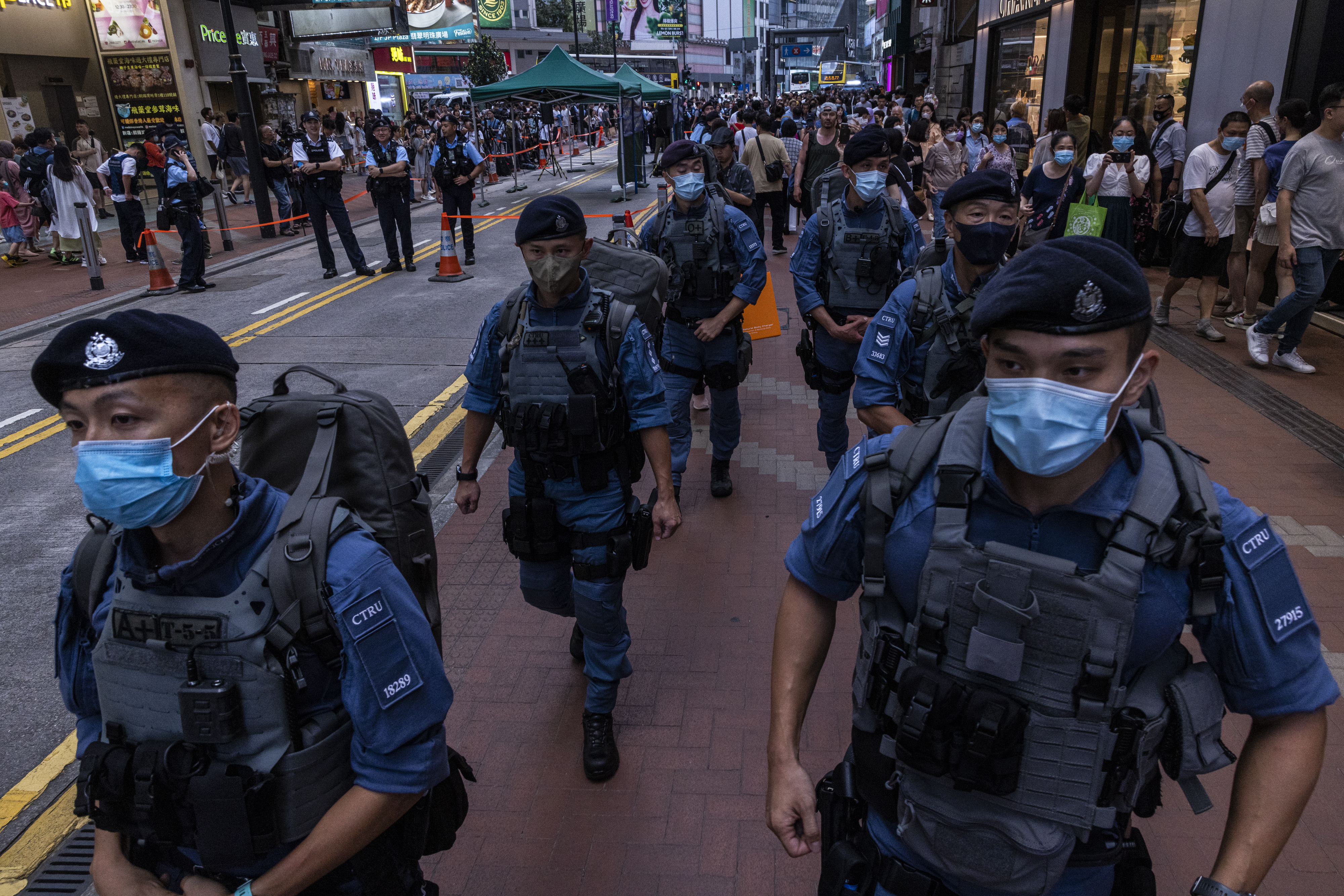 Police officers from Hong Kong's counter-terrorism unit patrol near Victoria Park, the city's venue for the annual 1989 Tiananmen massacre vigil