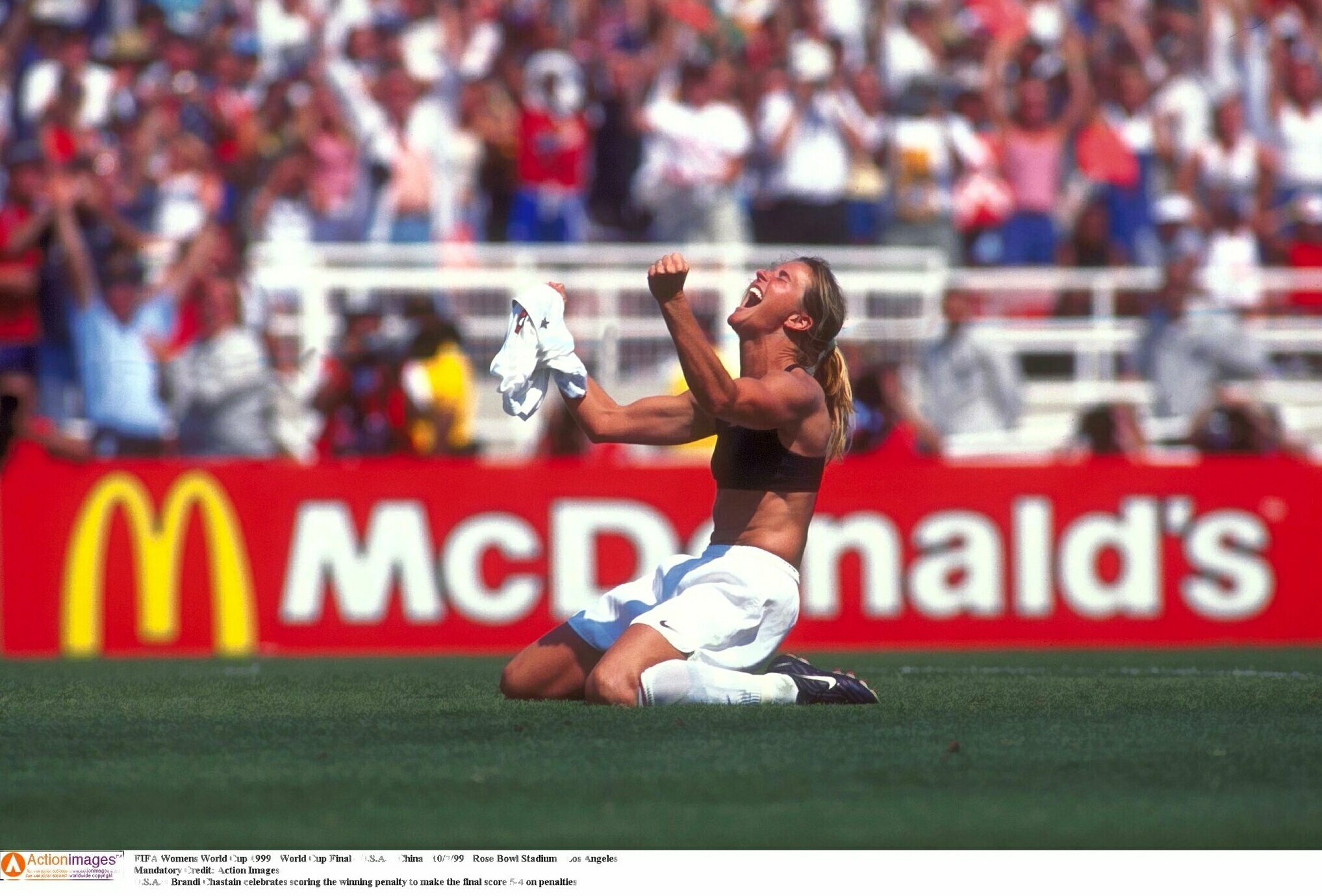 USA’s Brandi Chastain celebrates scoring the winning penalty in the 1999 Women’s World Cup [Action Images via Reuters]