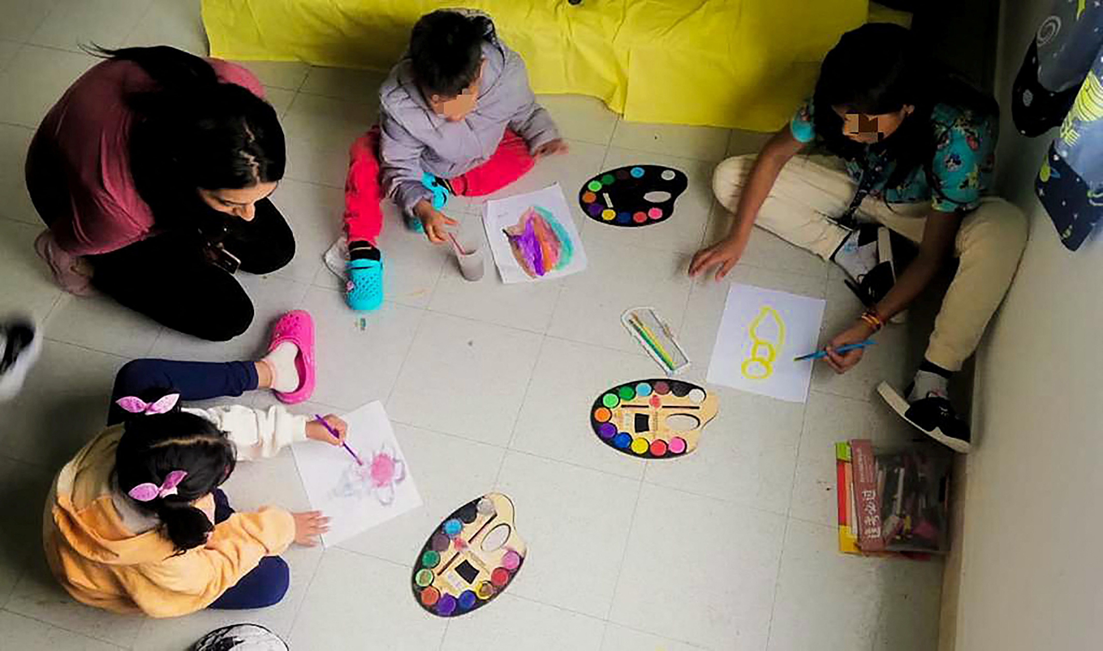 Children from a Cessna 206 plane, that crashed in thick jungle, play in a recovery center after being discharged from the Military Hospital in Bogota, Colombia, in this handout photo released and distributed on July 14, 2023 by Colombian Institute of Family Welfare/Handout via REUTERS ATTENTION EDITORS - THIS IMAGE WAS PROVIDED BY A THIRD PARTY. NO RESALES. NO ARCHIVES. MANDATORY CREDIT.