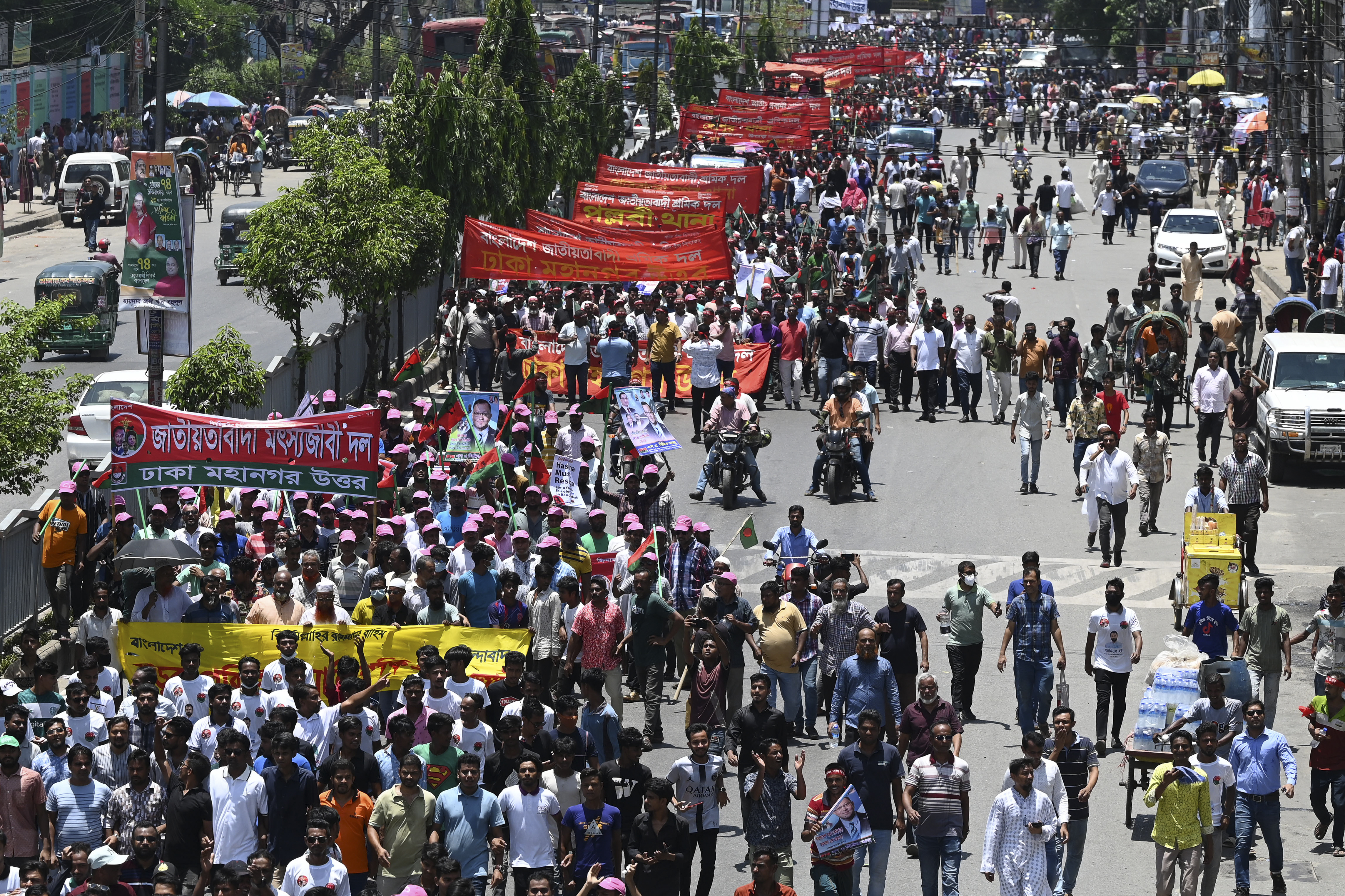 People take part in march to demand Hasina’s resignation in Dhaka
