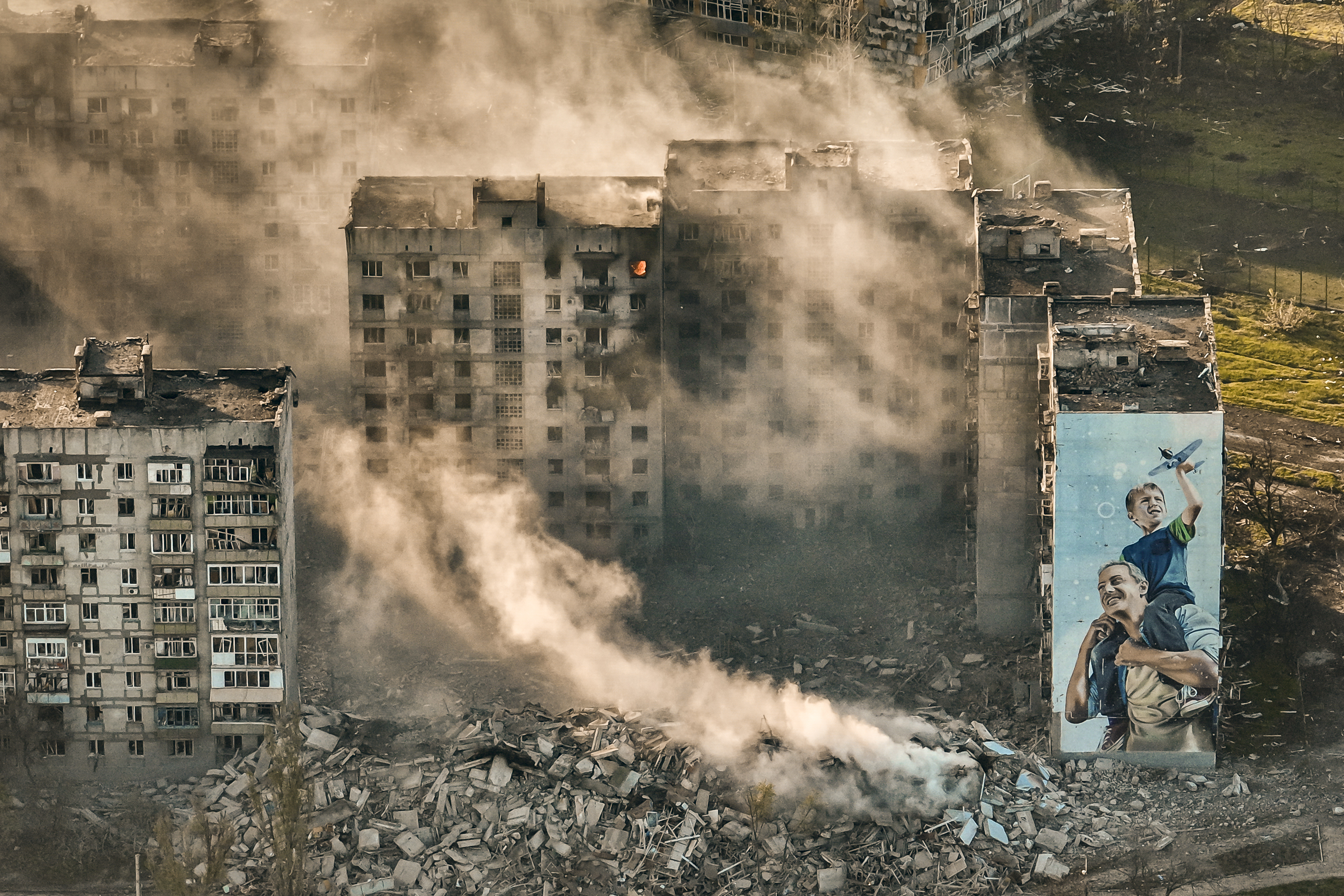 Smoke rises from a building in Bakhmut,