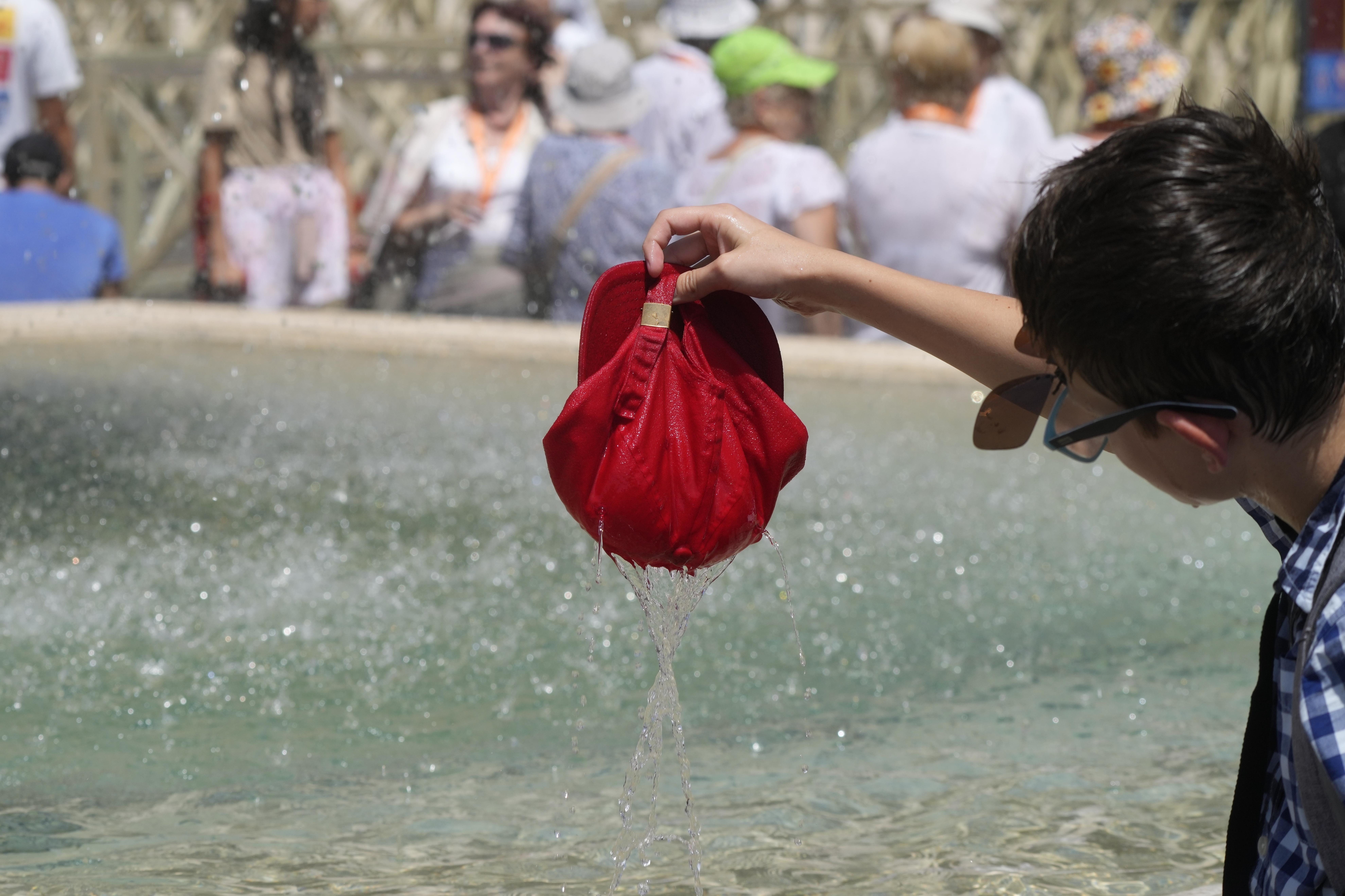 Around the world, millions feel the heat of an unrelenting summer