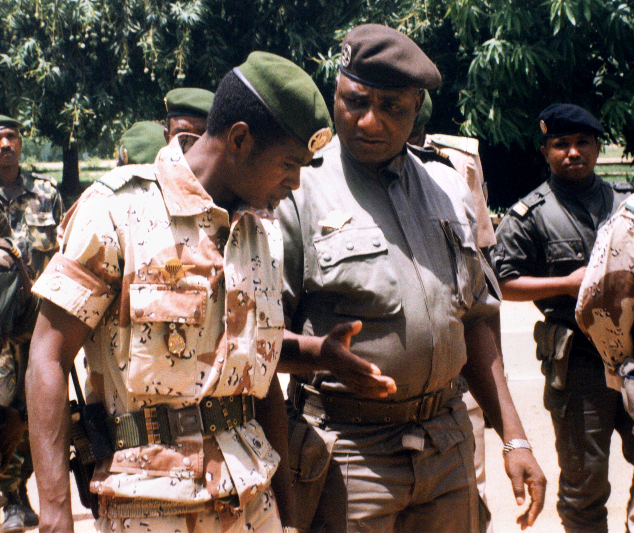The new military ruler of Niger, Major Daouda Mallam Wanke (R) chats with his chief of staff, Lieutenant Colonel Zanguina, as he makes his first public appearance14 April 1999 in Niamey, since the coup in which his predecessor Ibrahim Bare Mainassa was killed 09 April 1999