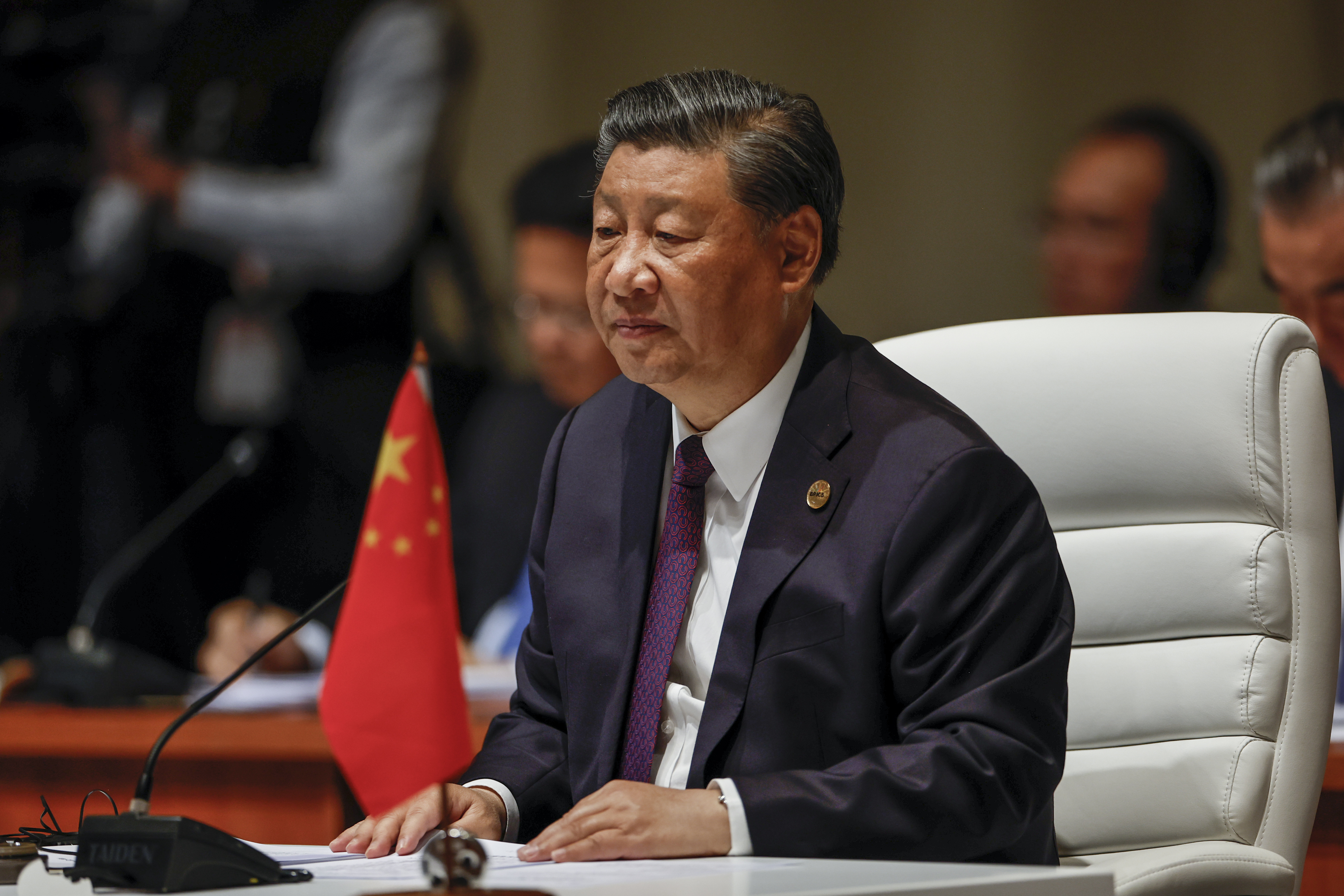 Xi
