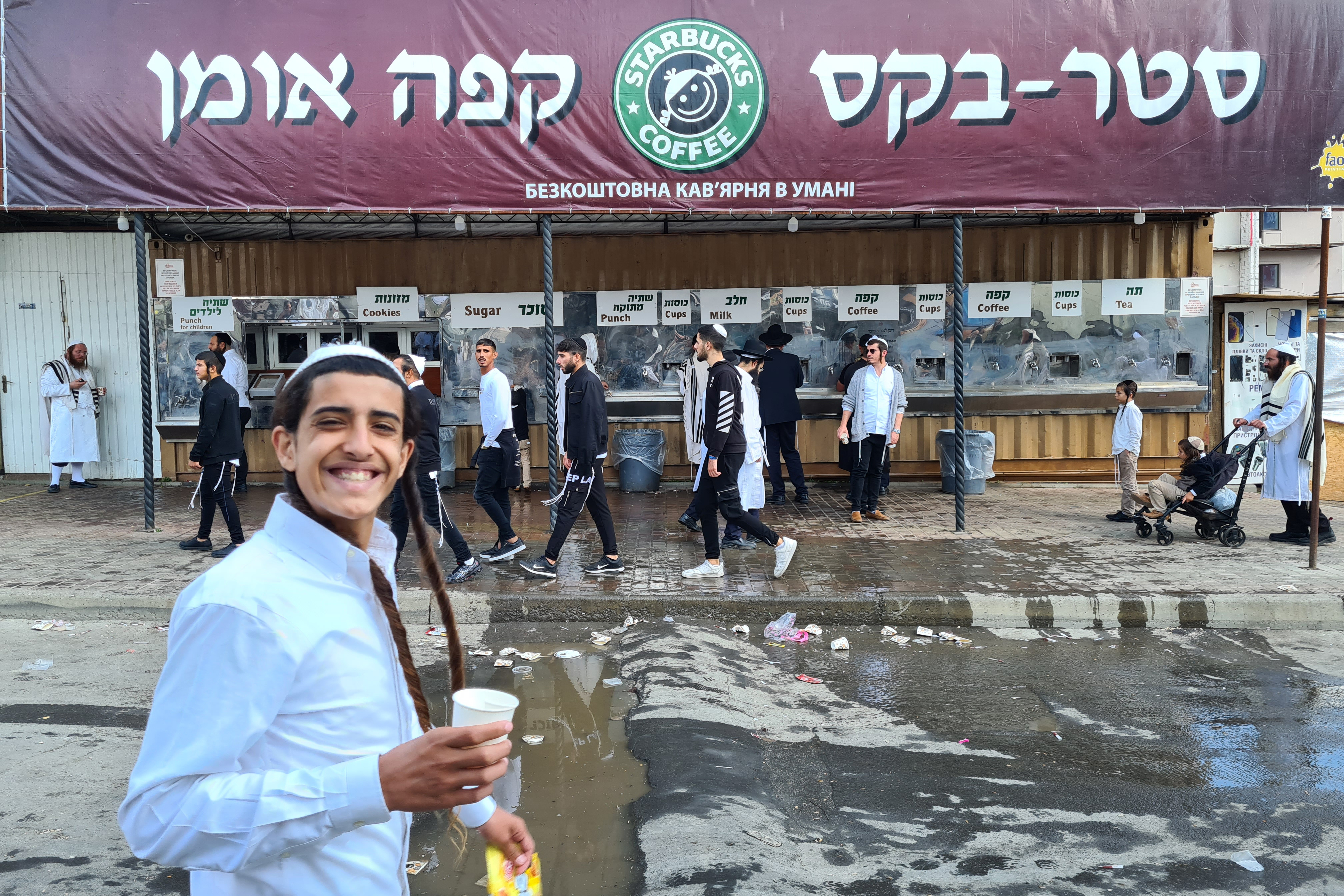 A Hasidic pilgrim walks towards the grave of Rabbi Nachman who died in Uman in 1810