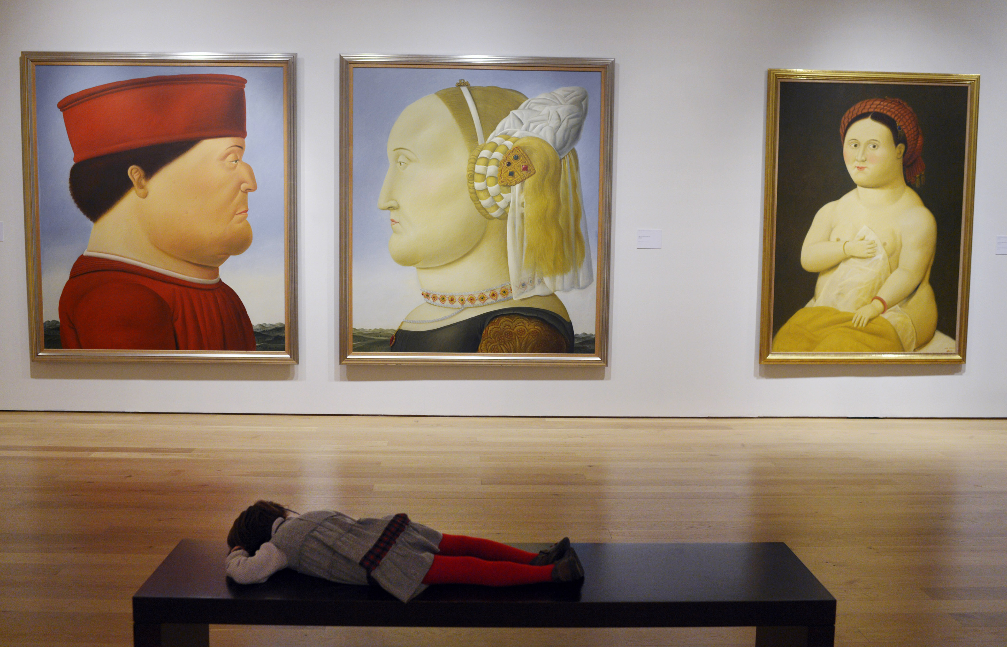 A young visitor observes Botero’s paintings at the Museo de Bellas Artes in Bilbao, Spain, in 2012